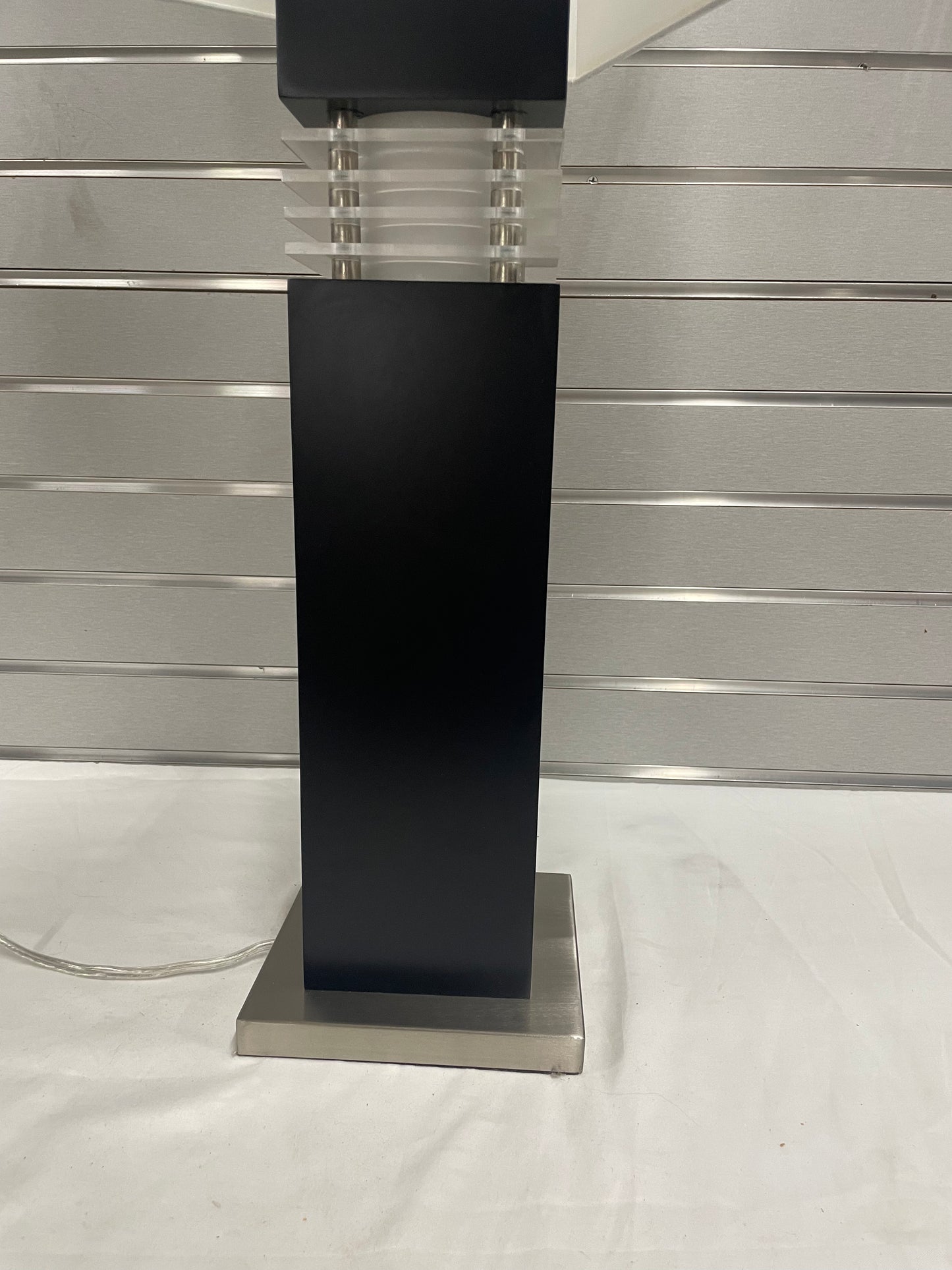 Contemporary Black and White Wooden Sports Lamp. Black post and white shade. All parts included. 32 inches tall. 5169555