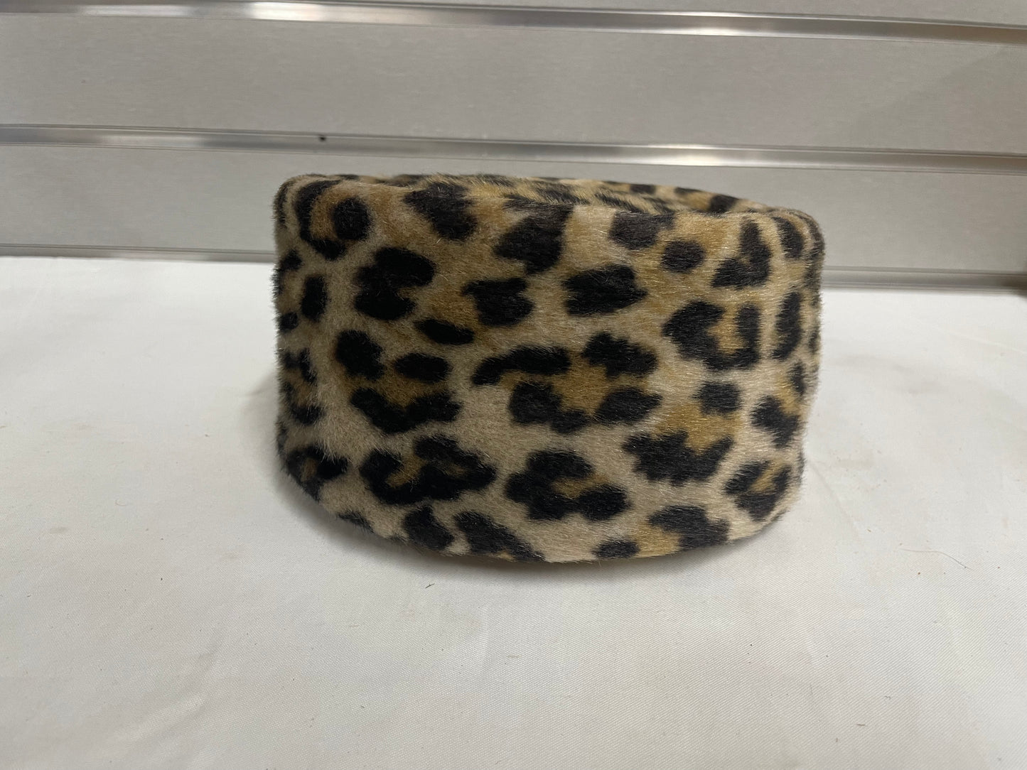 Pogue’s leopard Print winter women’s hat. In original box and packaging.
