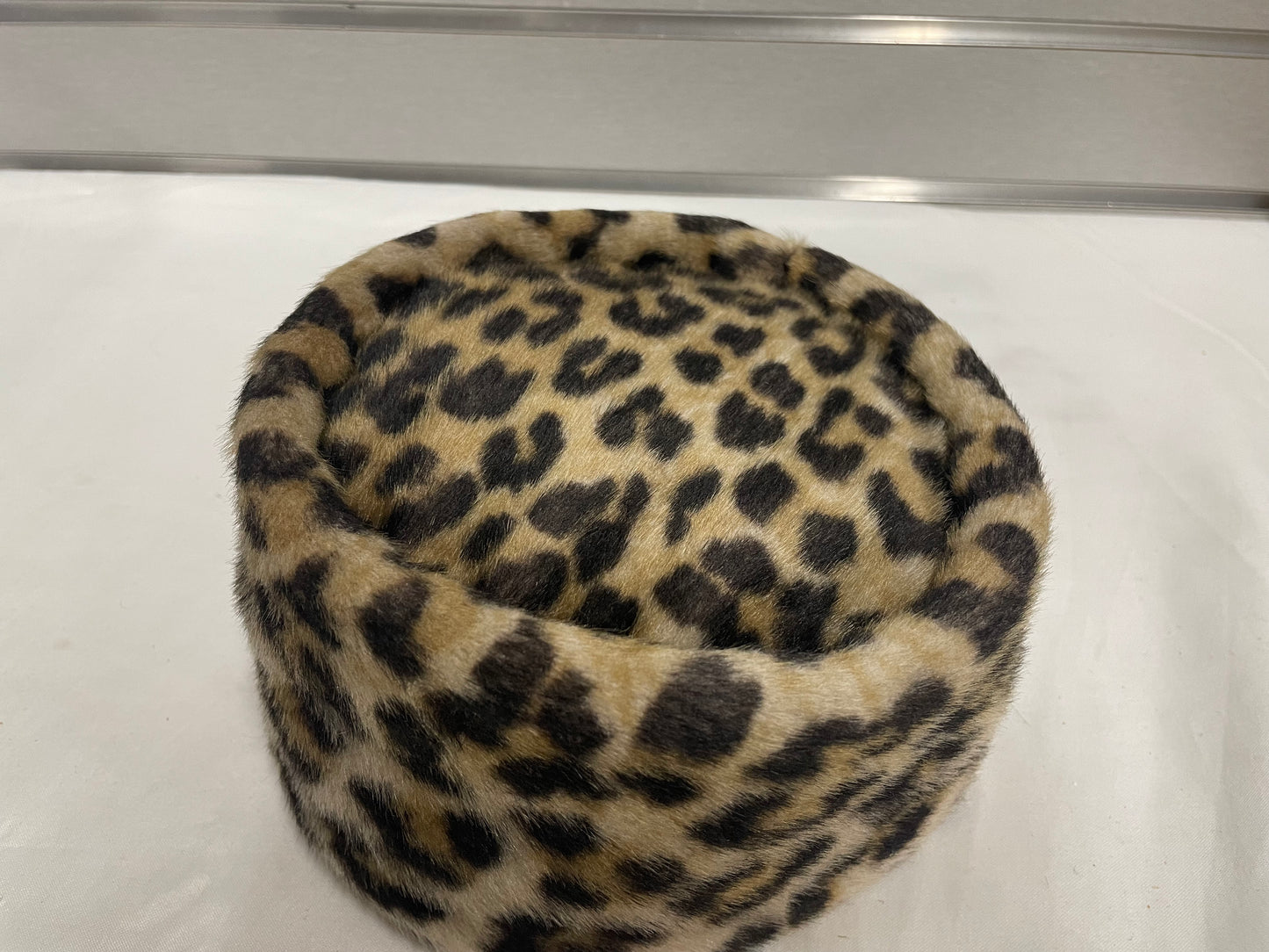 Pogue’s leopard Print winter women’s hat. In original box and packaging.
