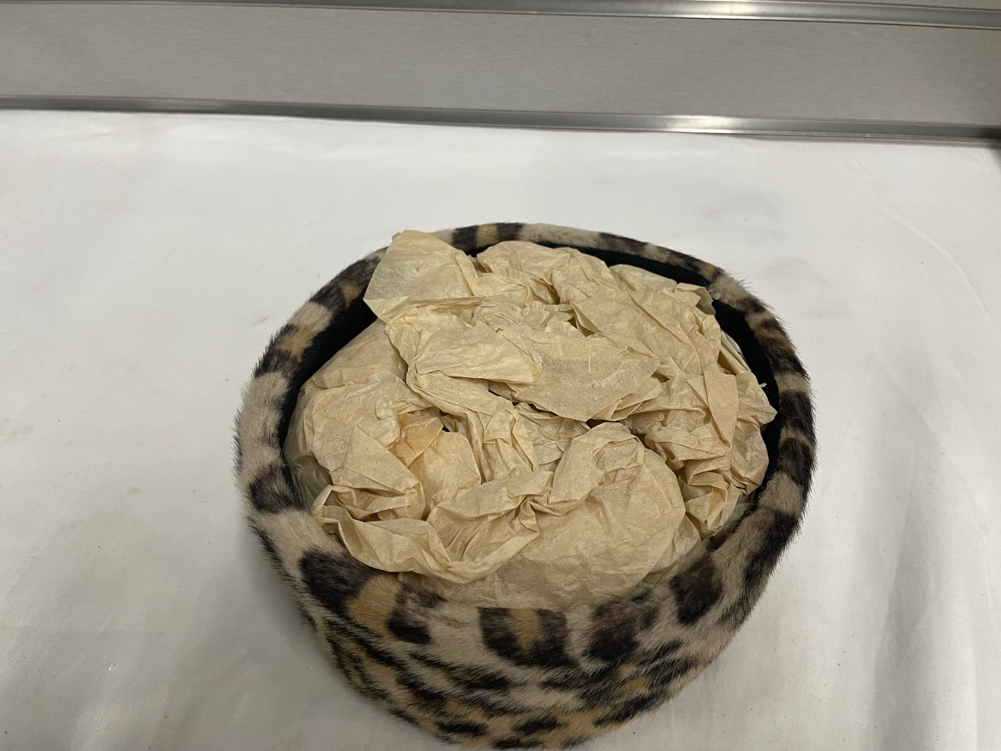 Pogue’s leopard Print winter women’s hat. In original box and packaging.