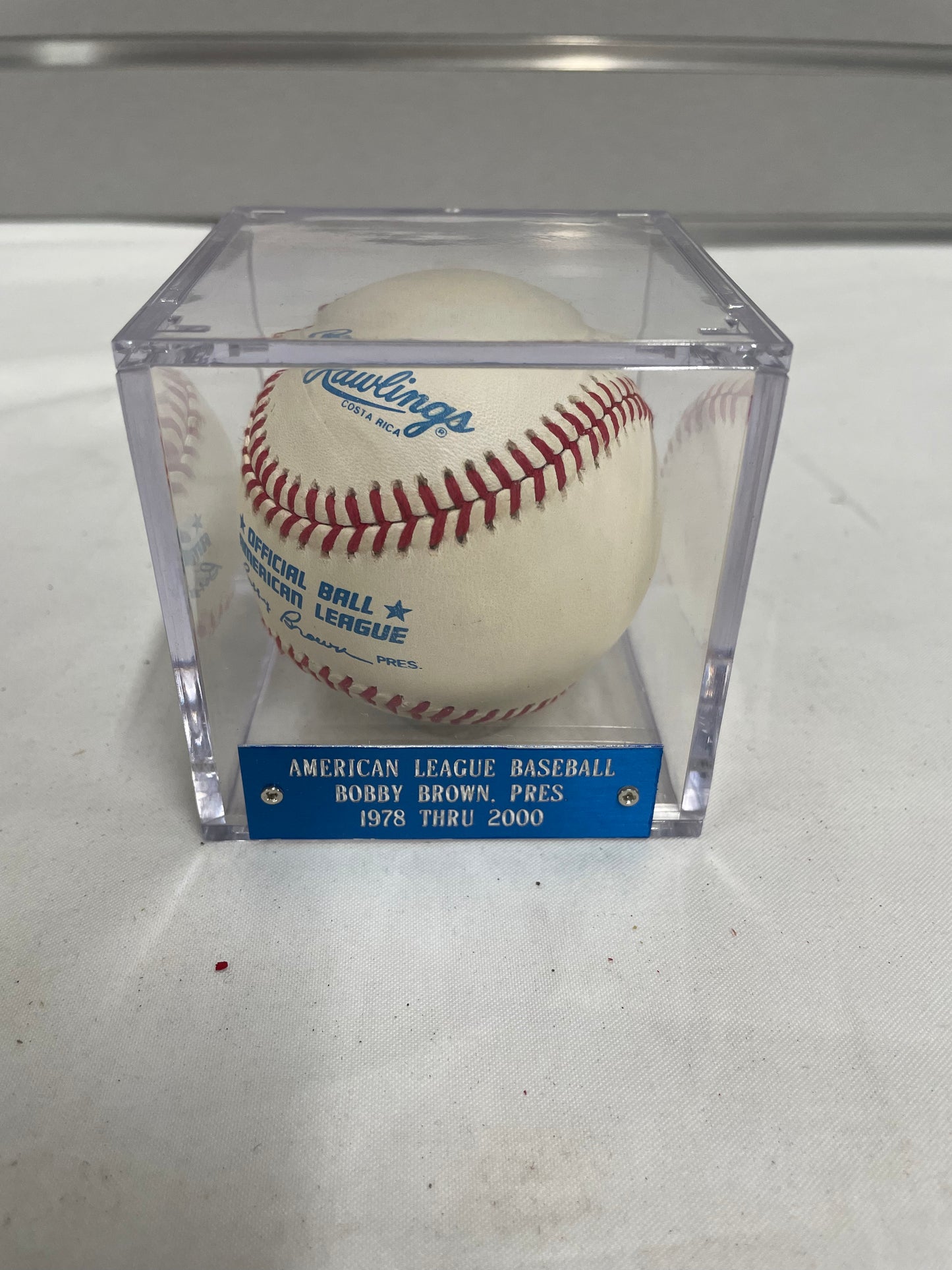Official American League Baseball Bobby Brown President 1978-2000. Comes with crystal clear case.