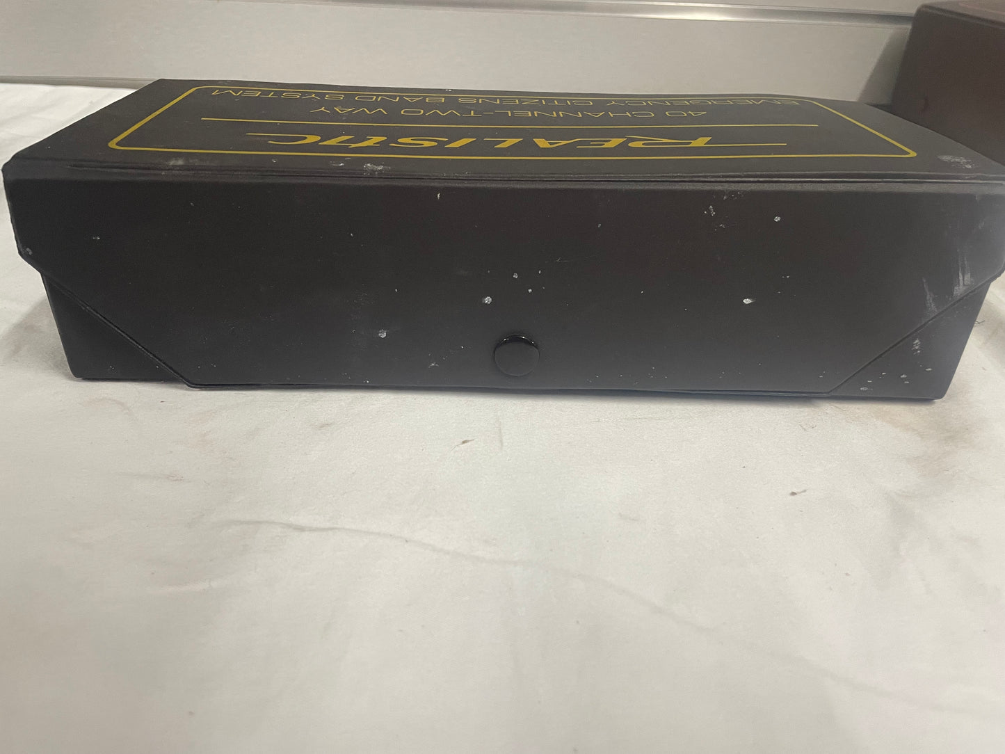 Realistic 40 Channel Two Way Emergency Citizens Band System. Yellow smaller system. Comes with all parts. Barely used. Comes with manual and operating instructions.