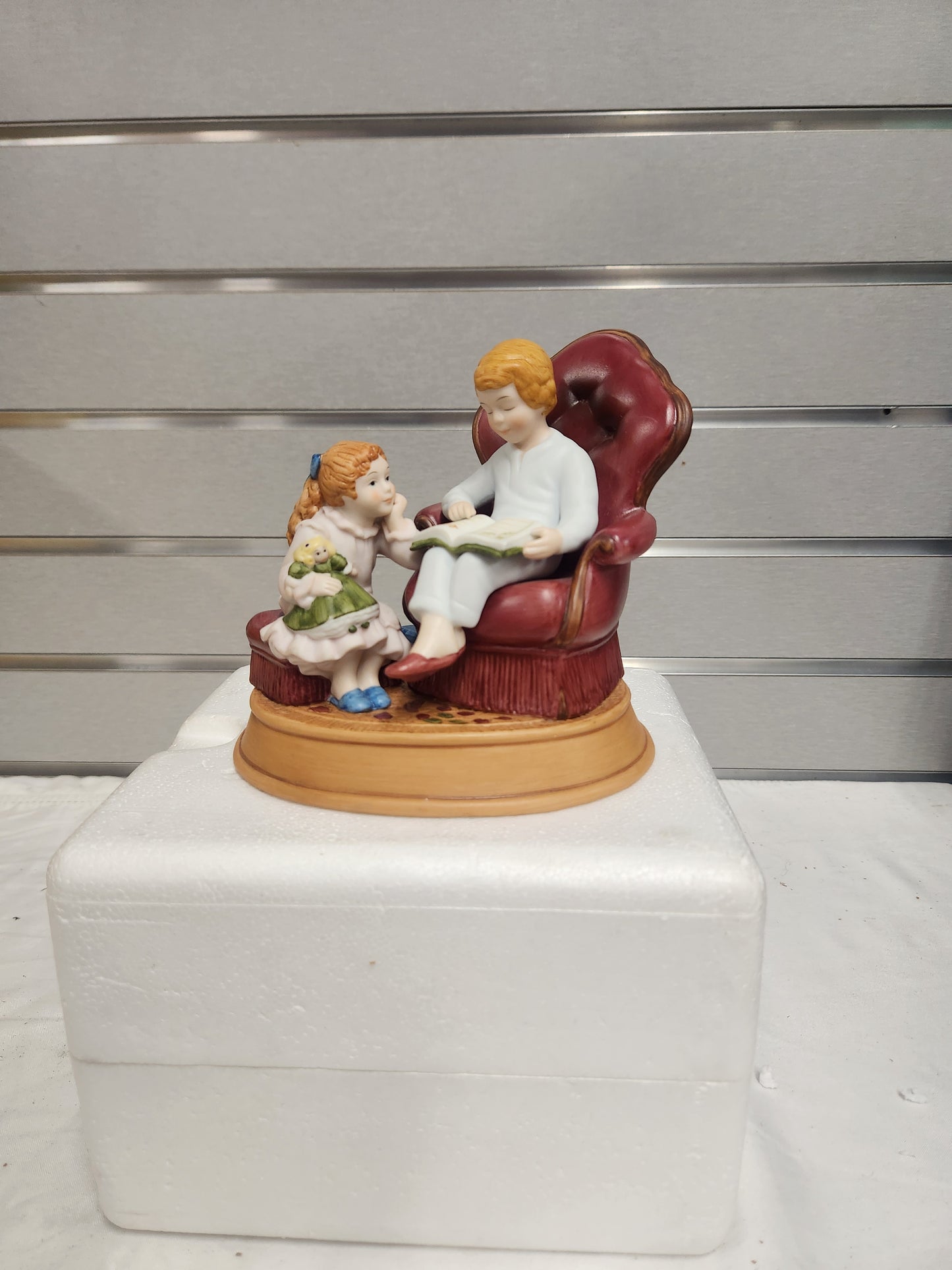 Enjoying the Night Before Christmas, Avon Christmas Memories Series. 1983 Porcelain Figurine.