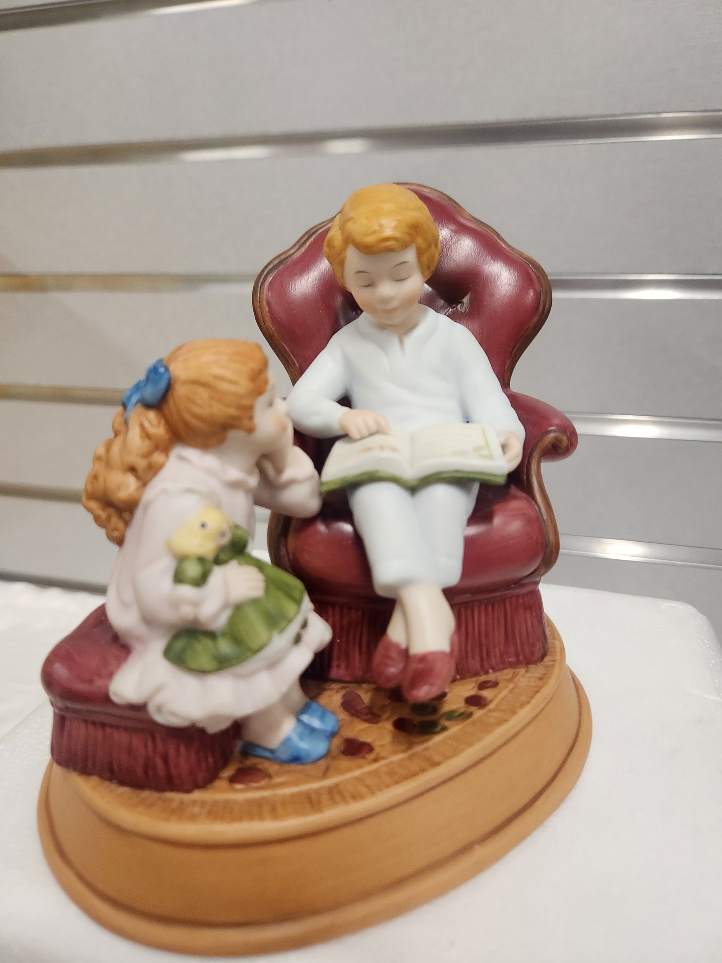 Enjoying the Night Before Christmas, Avon Christmas Memories Series. 1983 Porcelain Figurine.