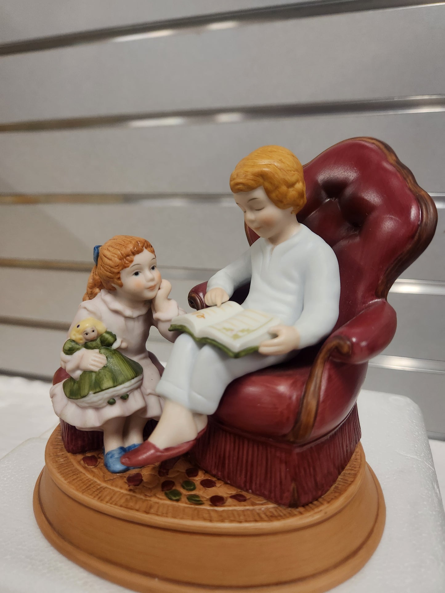 Enjoying the Night Before Christmas, Avon Christmas Memories Series. 1983 Porcelain Figurine.