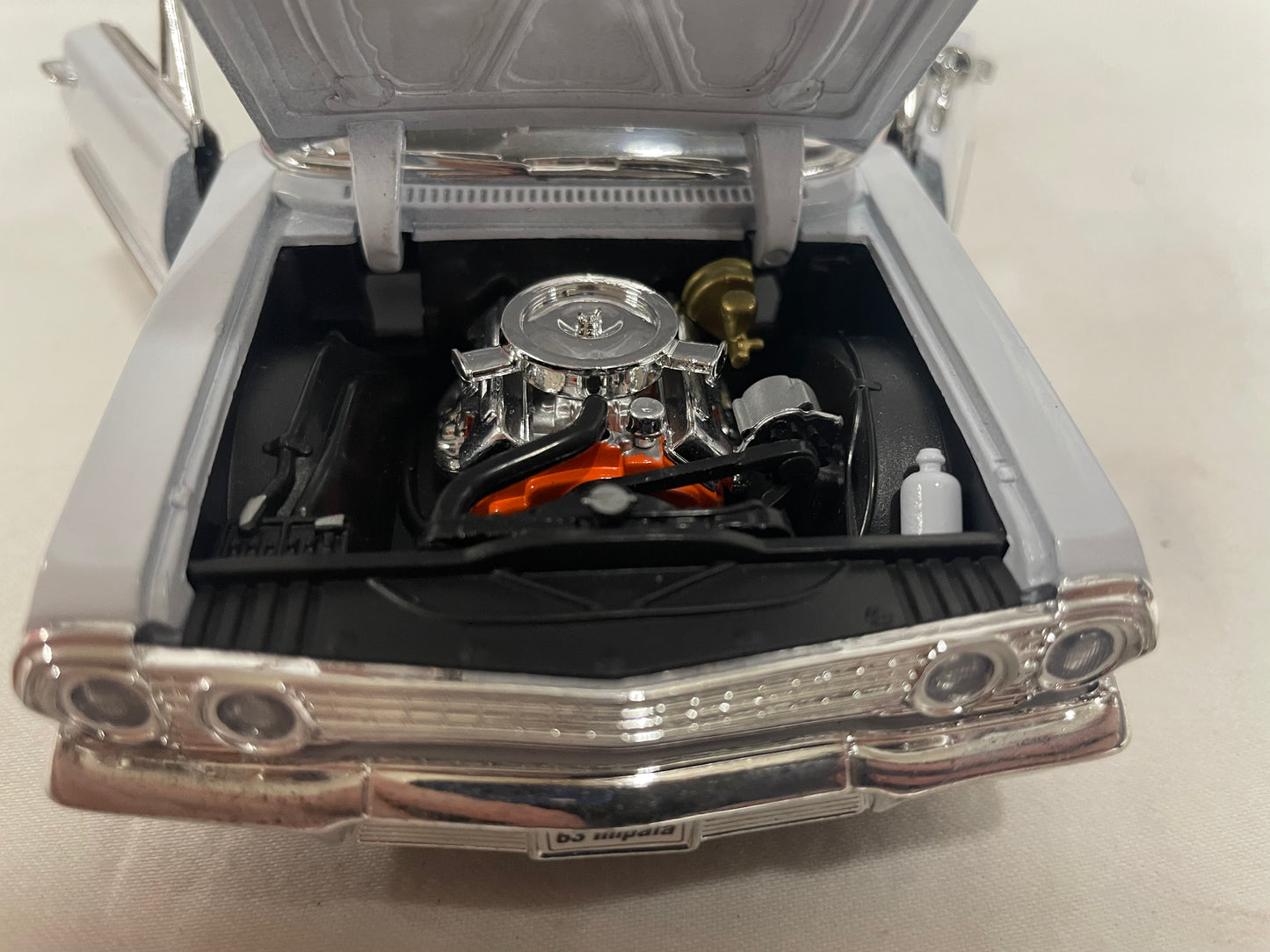 1963 Chevrolet Impala S.S. With display case.