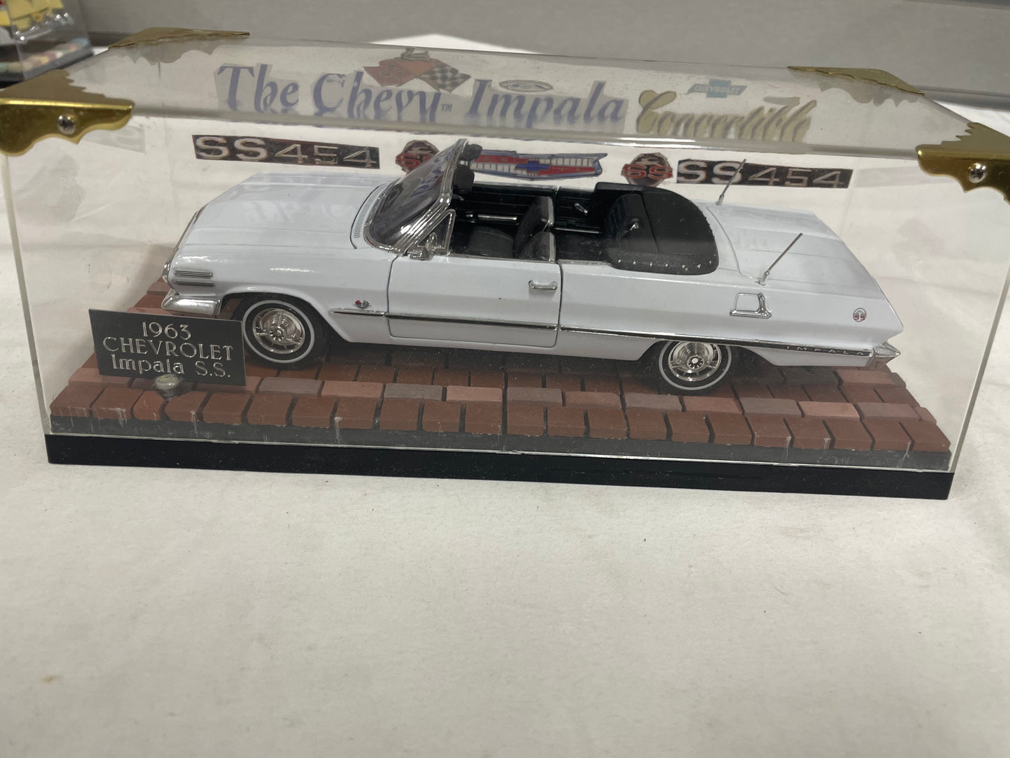 1963 Chevrolet Impala S.S. With display case.