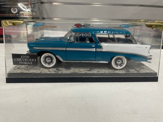 1956 Chevrolet Nomad with display case.