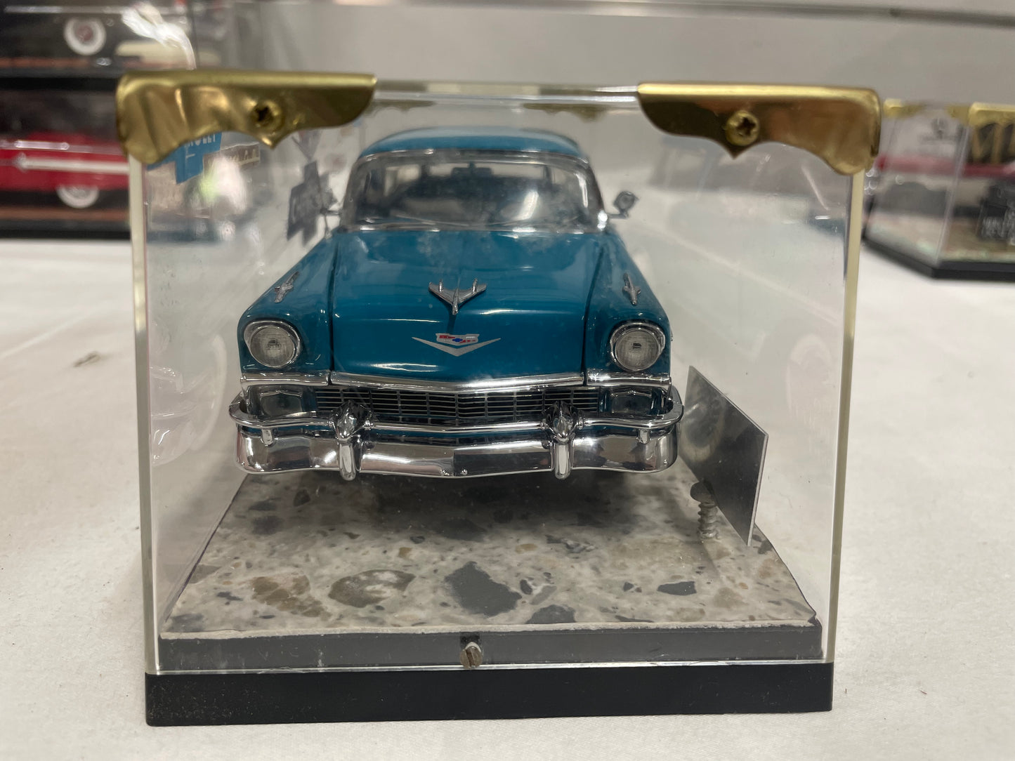 1956 Chevrolet Nomad with display case.