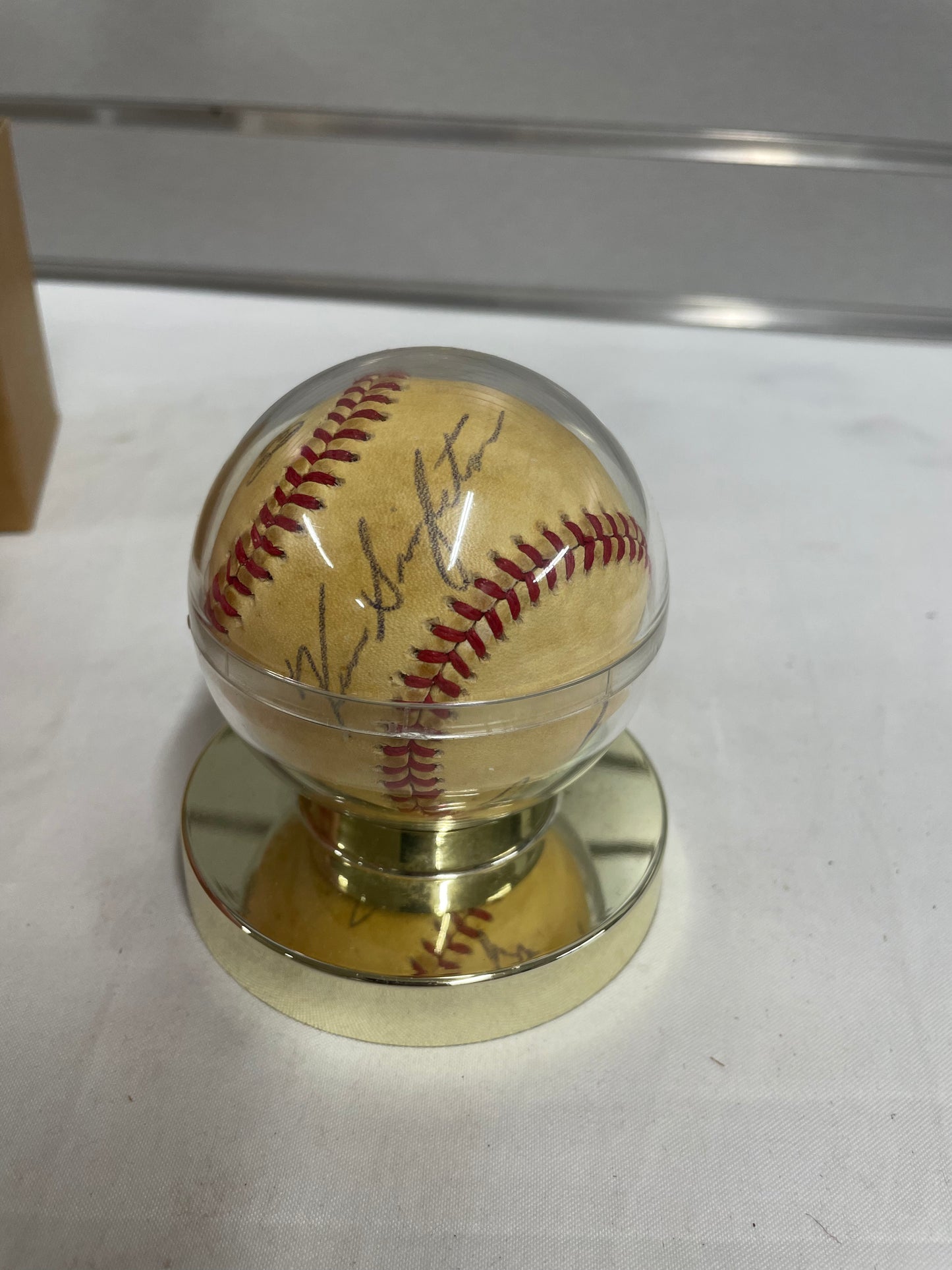 Signed Frank Robinson Baseball from 1970 World Series. In plastic case. Multiple signatures 5169565