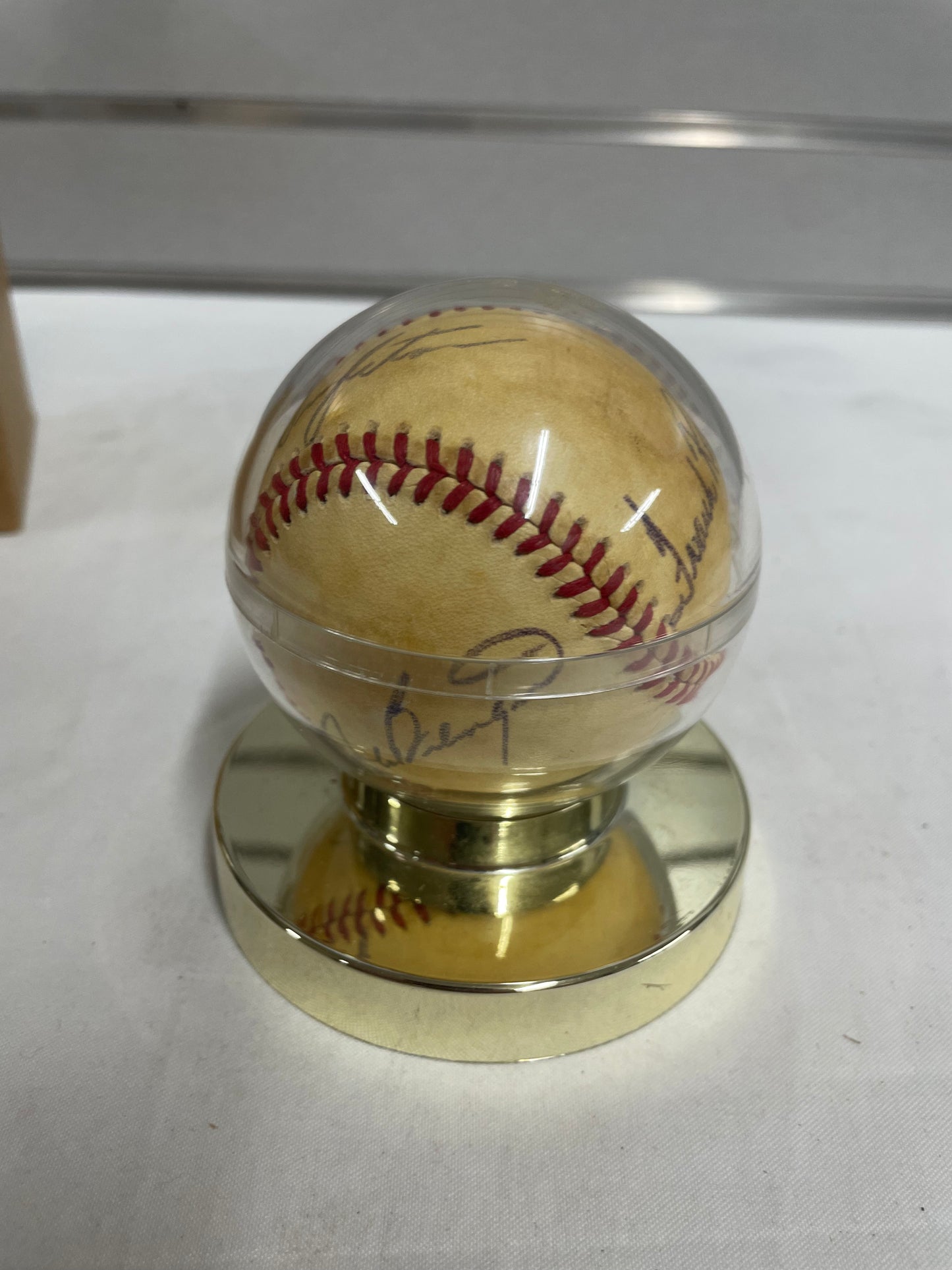 Signed Frank Robinson Baseball from 1970 World Series. In plastic case. Multiple signatures 5169565