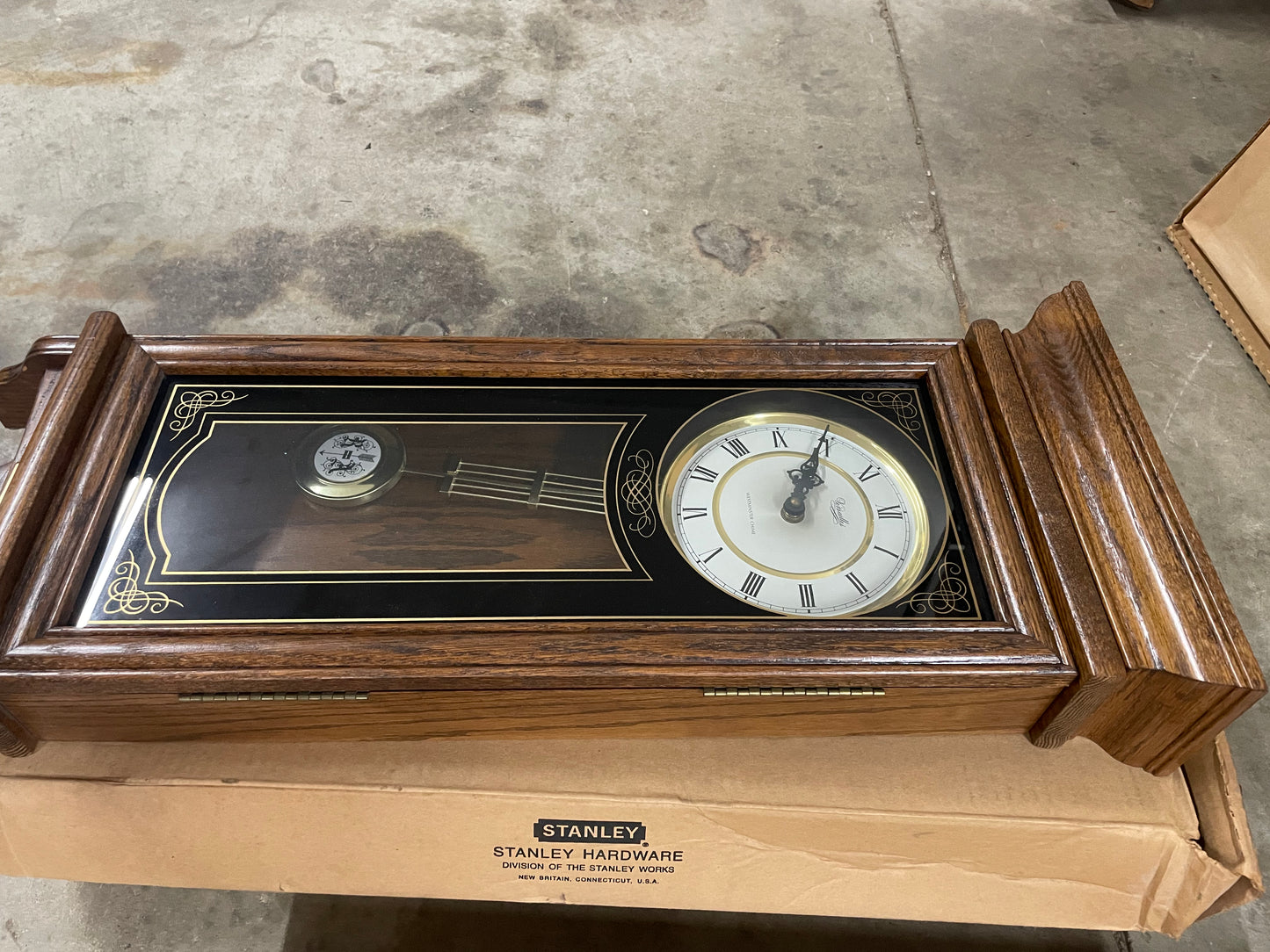 Versailles Wall Clock. Wooden clock. Comes with all parts. 31x13inches. Opens up.