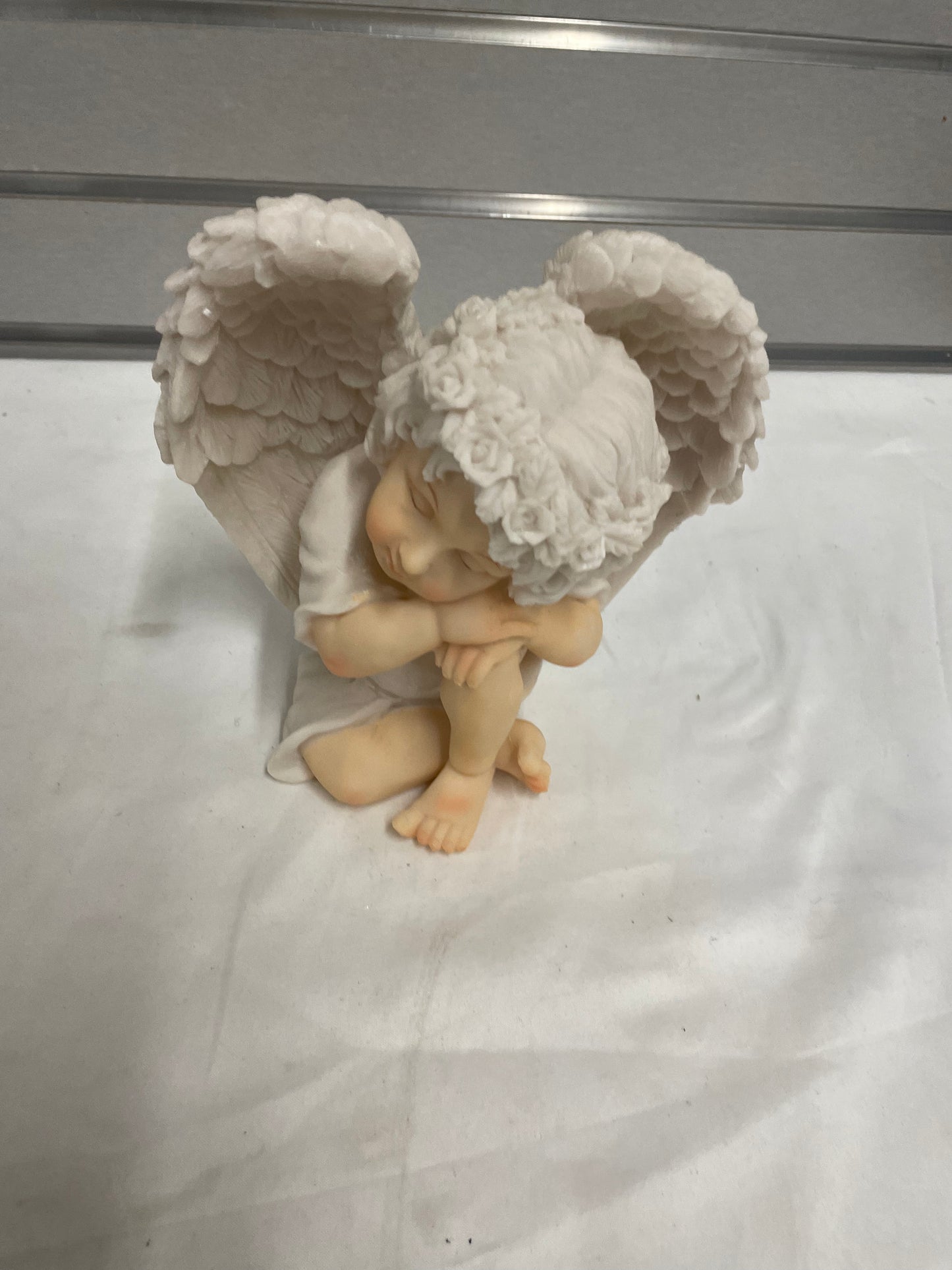 Ceramic Baby Angel sculpture. 7x7”