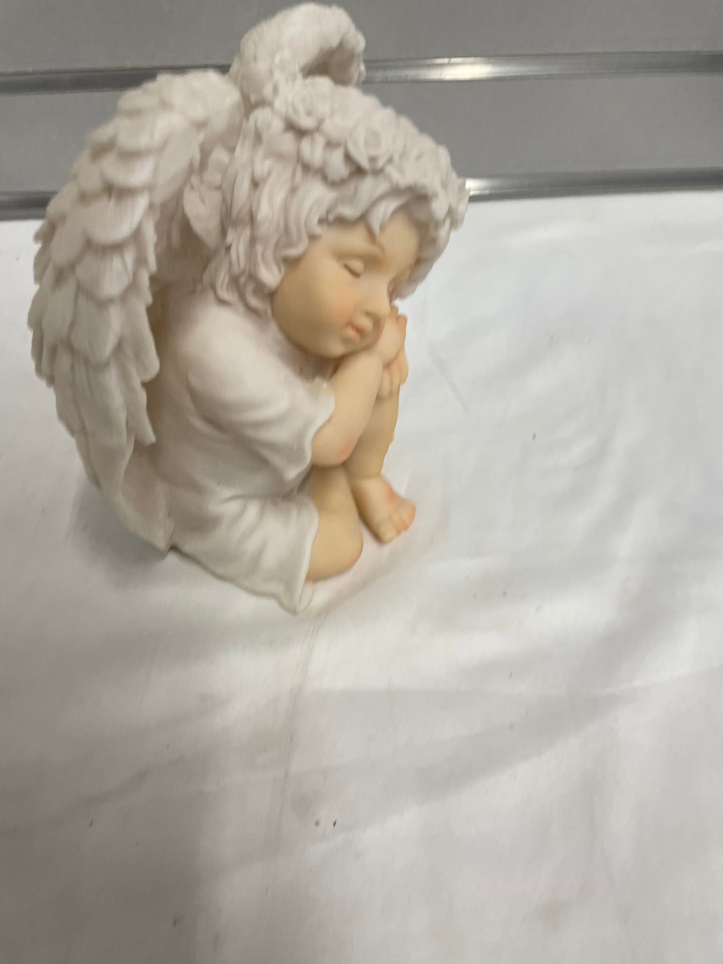 Ceramic Baby Angel sculpture. 7x7”