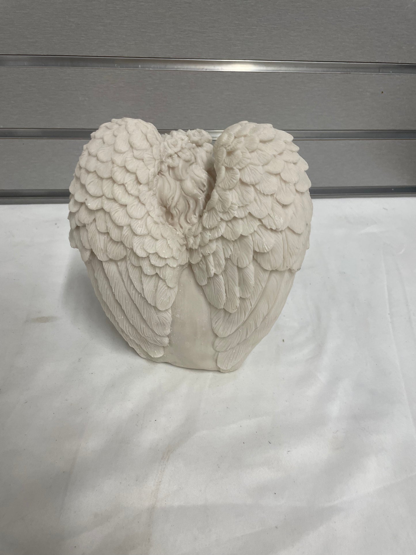 Ceramic Baby Angel sculpture. 7x7”