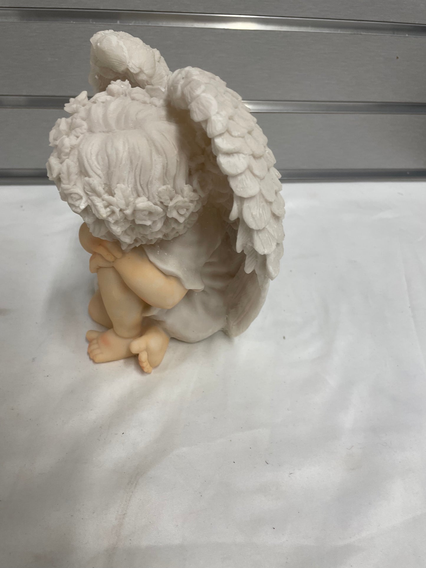 Ceramic Baby Angel sculpture. 7x7”