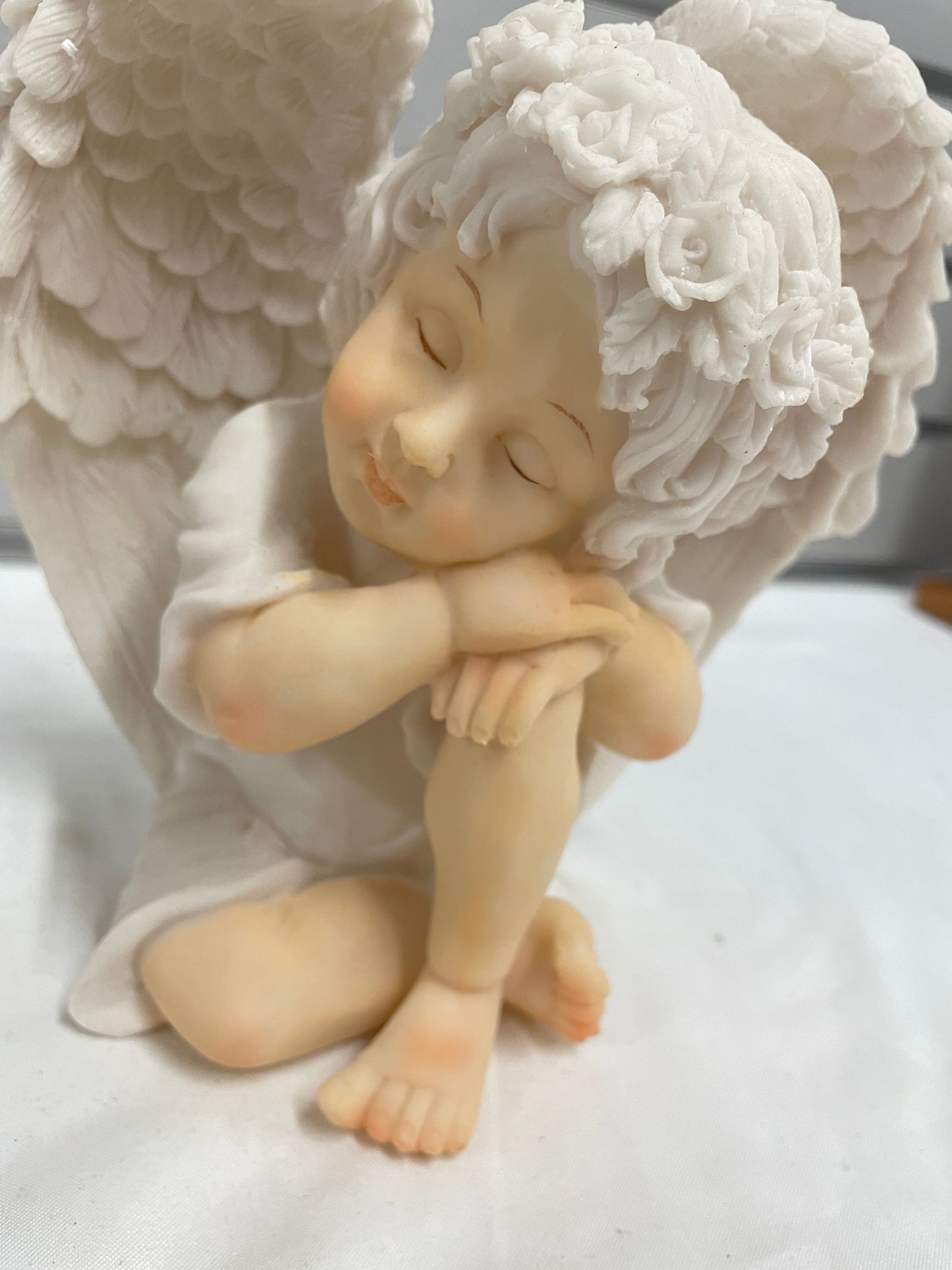 Ceramic Baby Angel sculpture. 7x7”