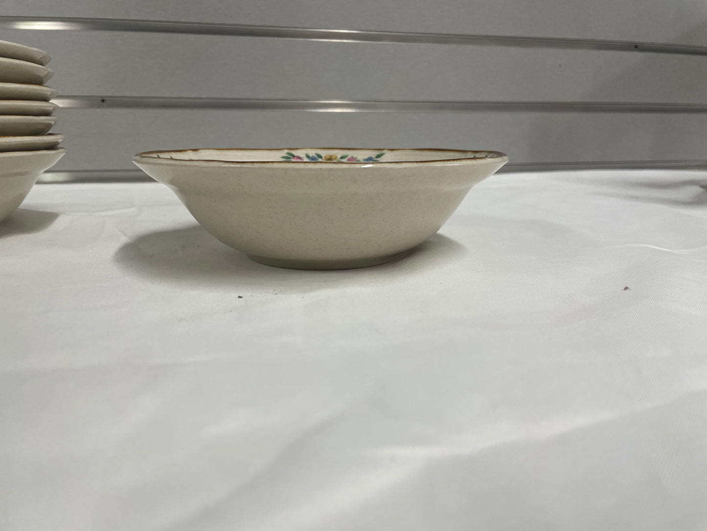 International Heartland Stoneware China Bowl Set. White Ceramic set with colorful designs.