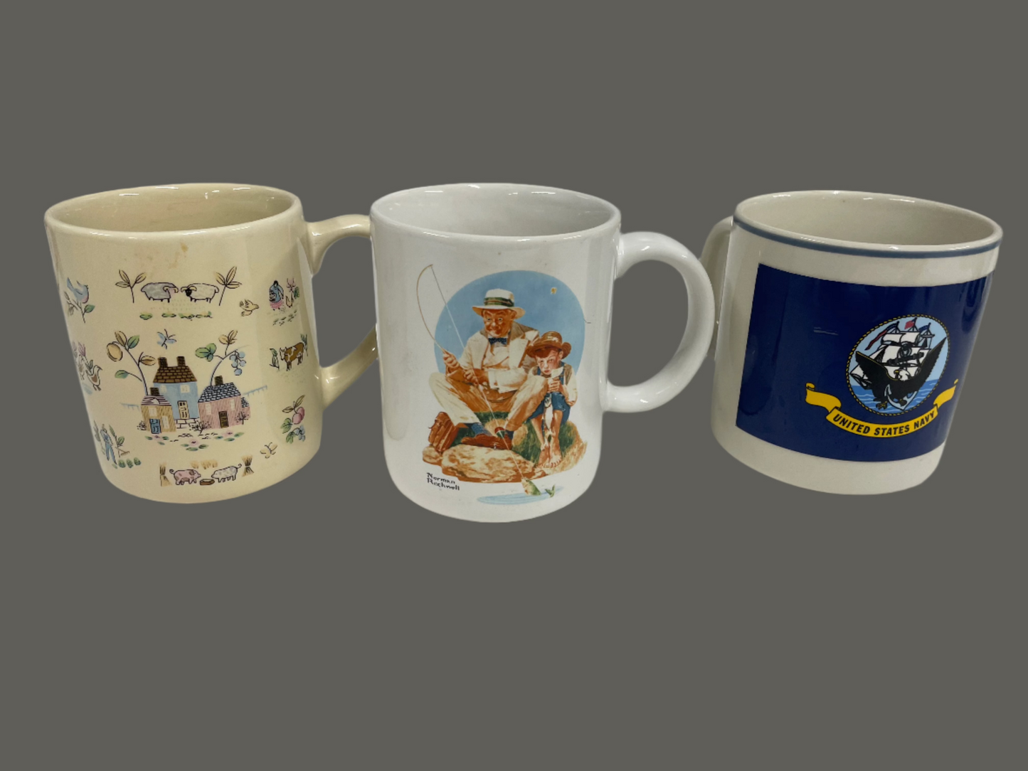 3 Piece Coffee mug set. All in good shape. Navy, Rockwell, and Farm designs.