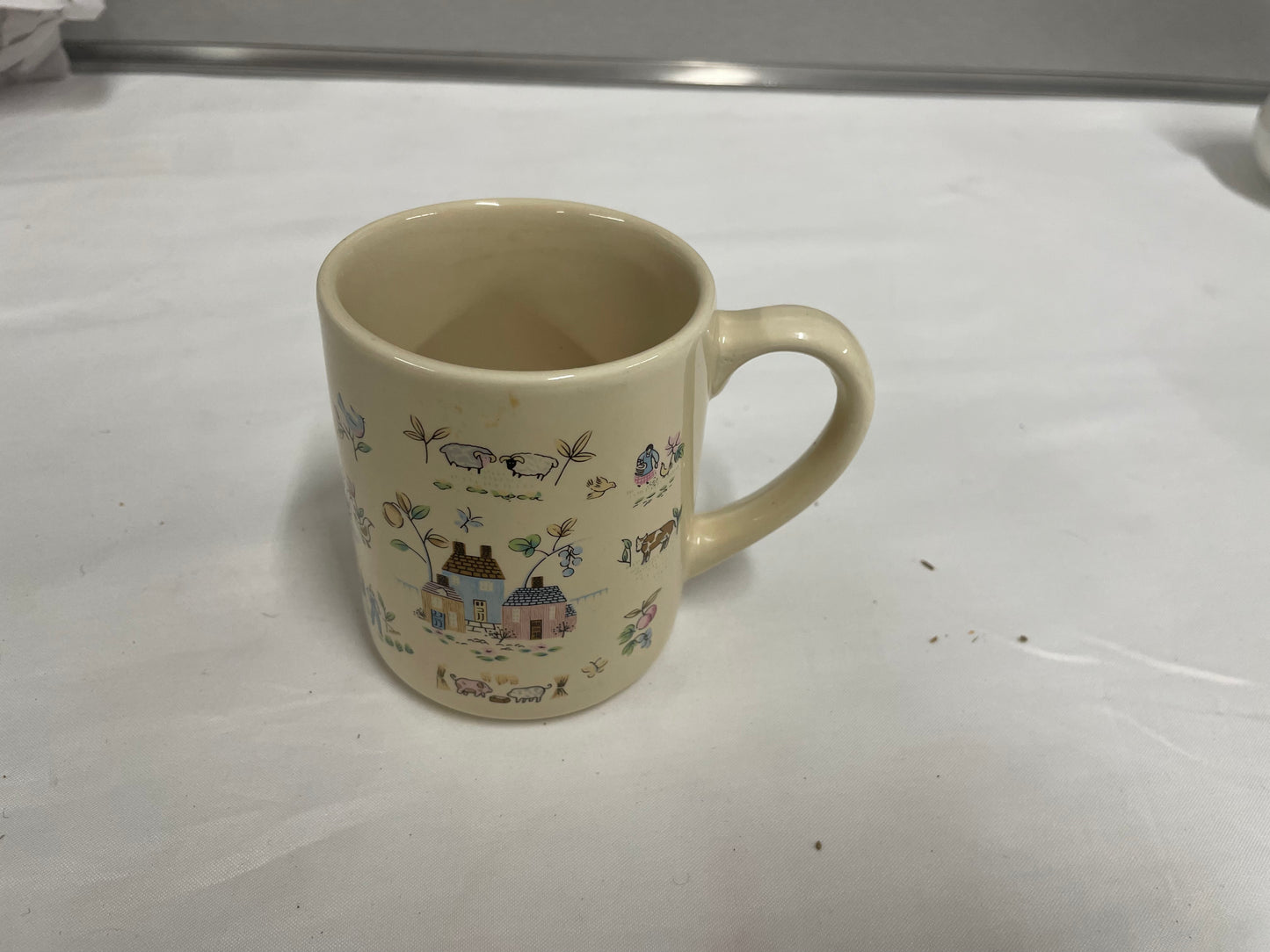 3 Piece Coffee mug set. All in good shape. Navy, Rockwell, and Farm designs.