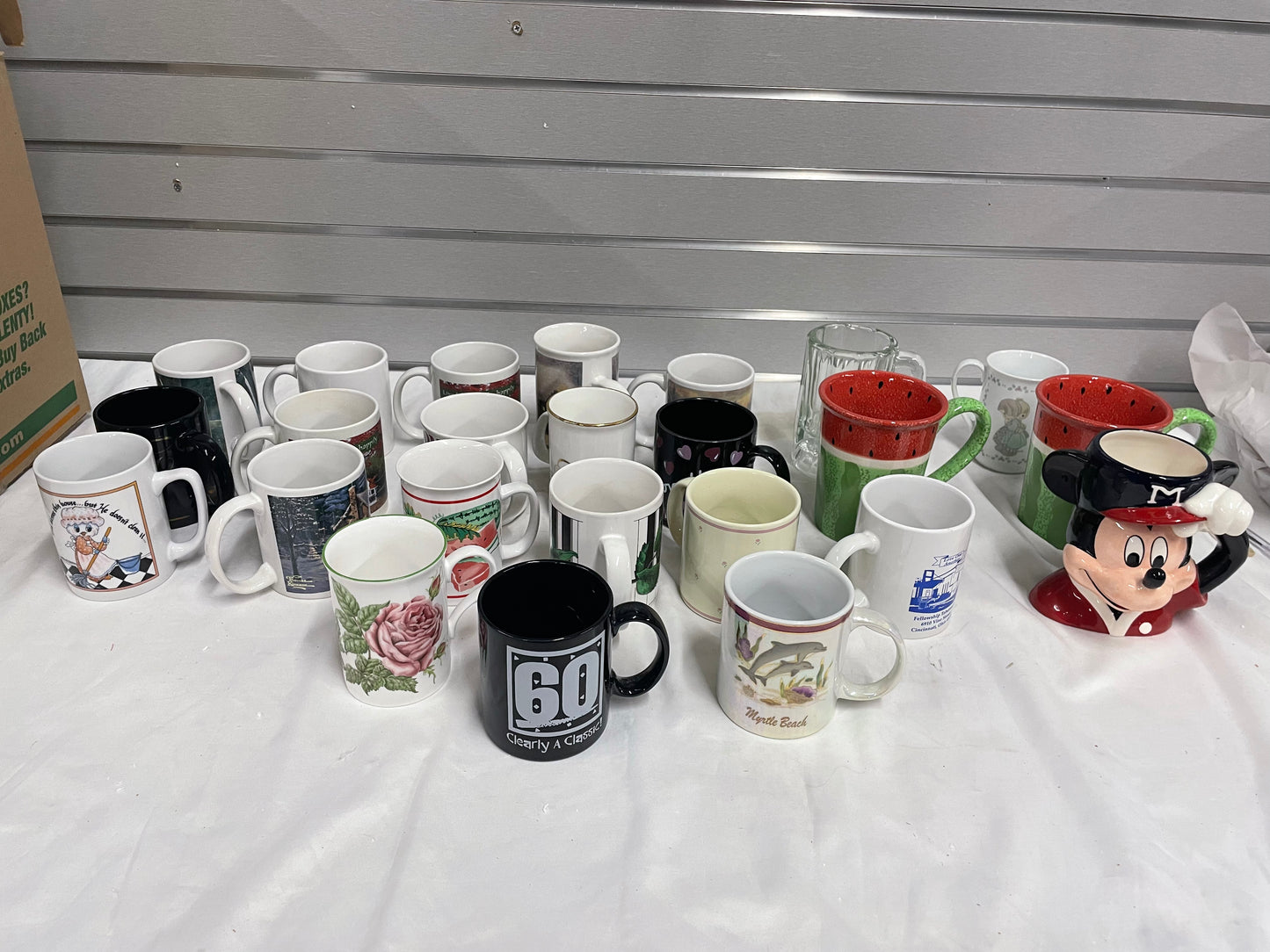 Collection of Miscellaneous Coffee Mugs. Come in all shapes, sizes and colors. 24 ceramic coffee mugs included.