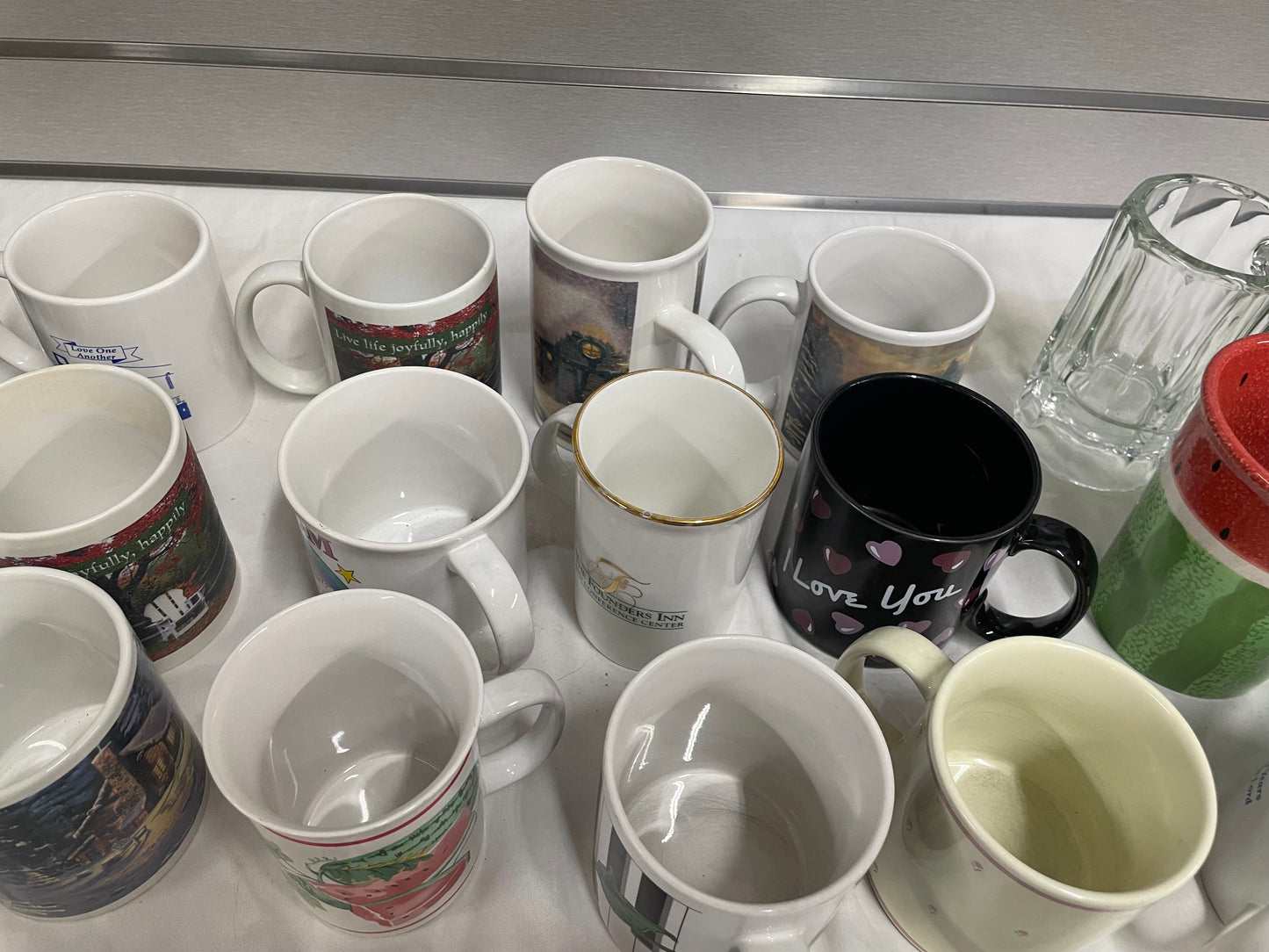 Collection of Miscellaneous Coffee Mugs. Come in all shapes, sizes and colors. 24 ceramic coffee mugs included.