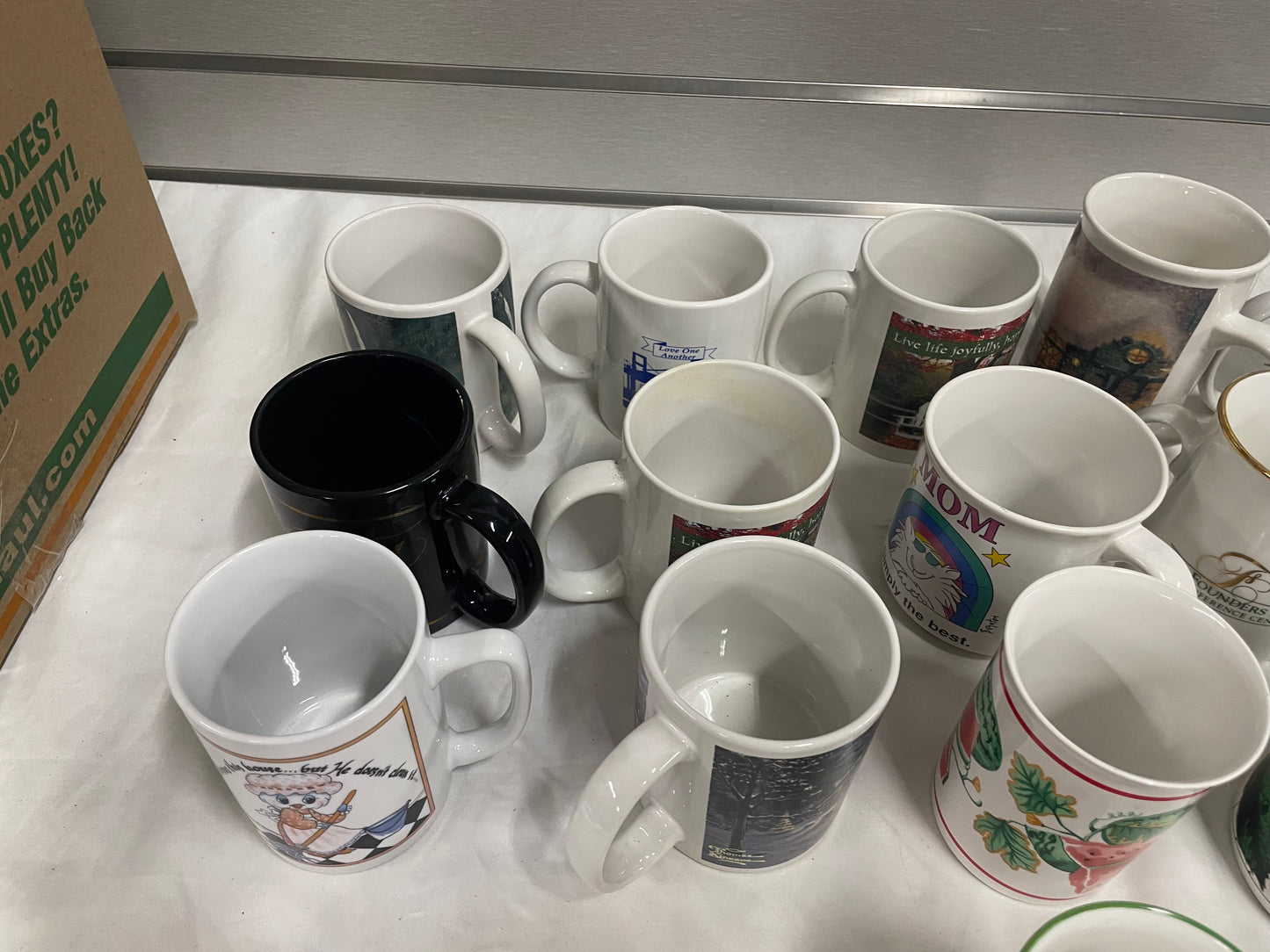 Collection of Miscellaneous Coffee Mugs. Come in all shapes, sizes and colors. 24 ceramic coffee mugs included.