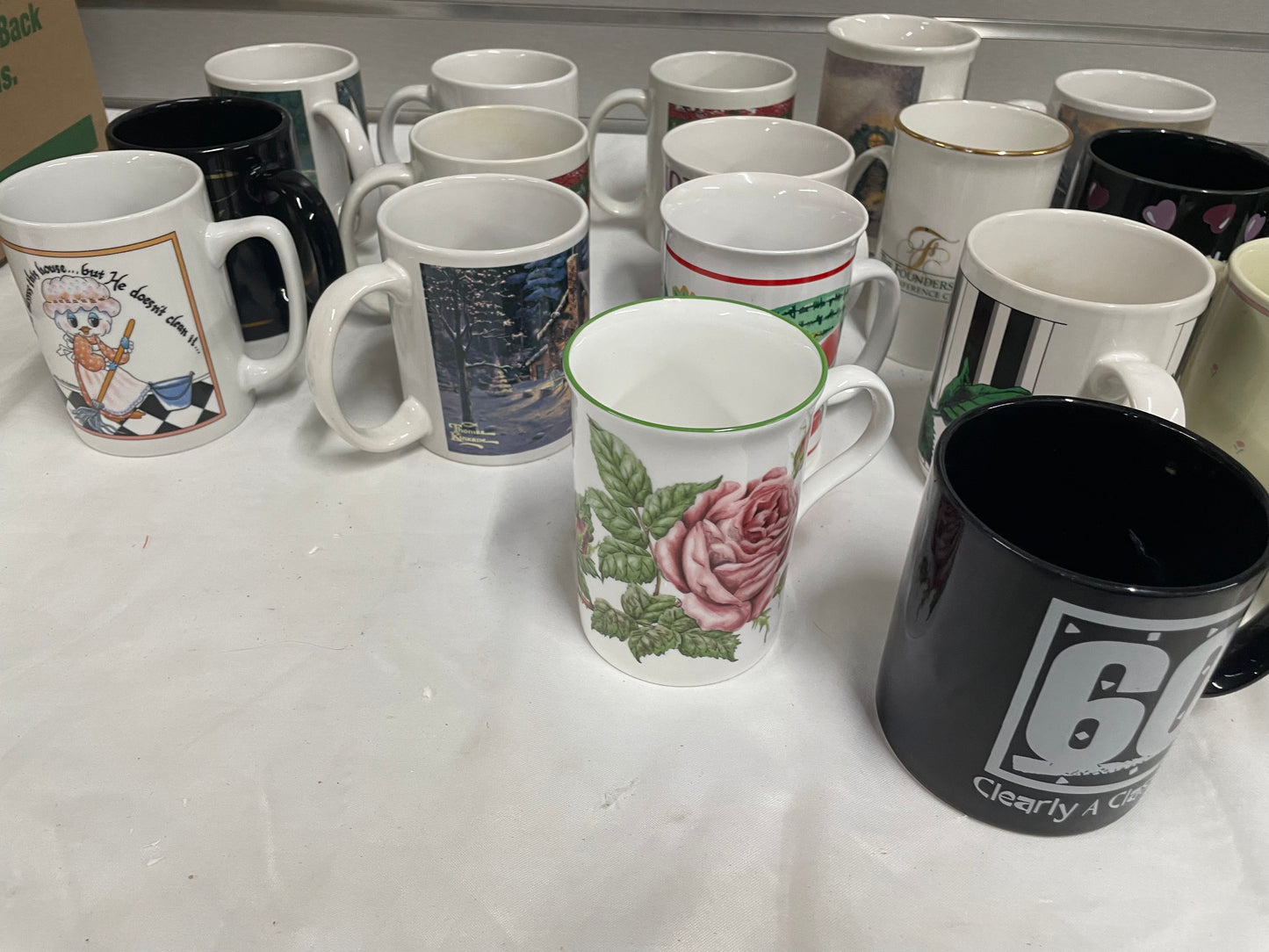 Collection of Miscellaneous Coffee Mugs. Come in all shapes, sizes and colors. 24 ceramic coffee mugs included.