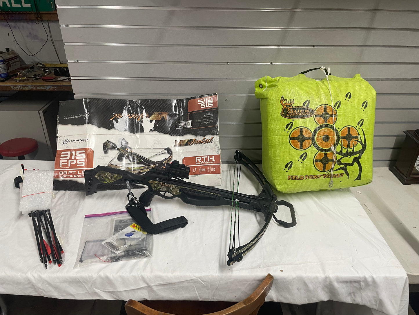 Barnett Jackal Crossbow with Arrows and Target. Crossbow is 315 FPS 88ft. Lbs. kinetic energy. 150 Draw Weight. 12” power strike. Barnett Easton Carbon Arrows. Comes with 7 arrows. Buck Commander. Barely used. 5169865