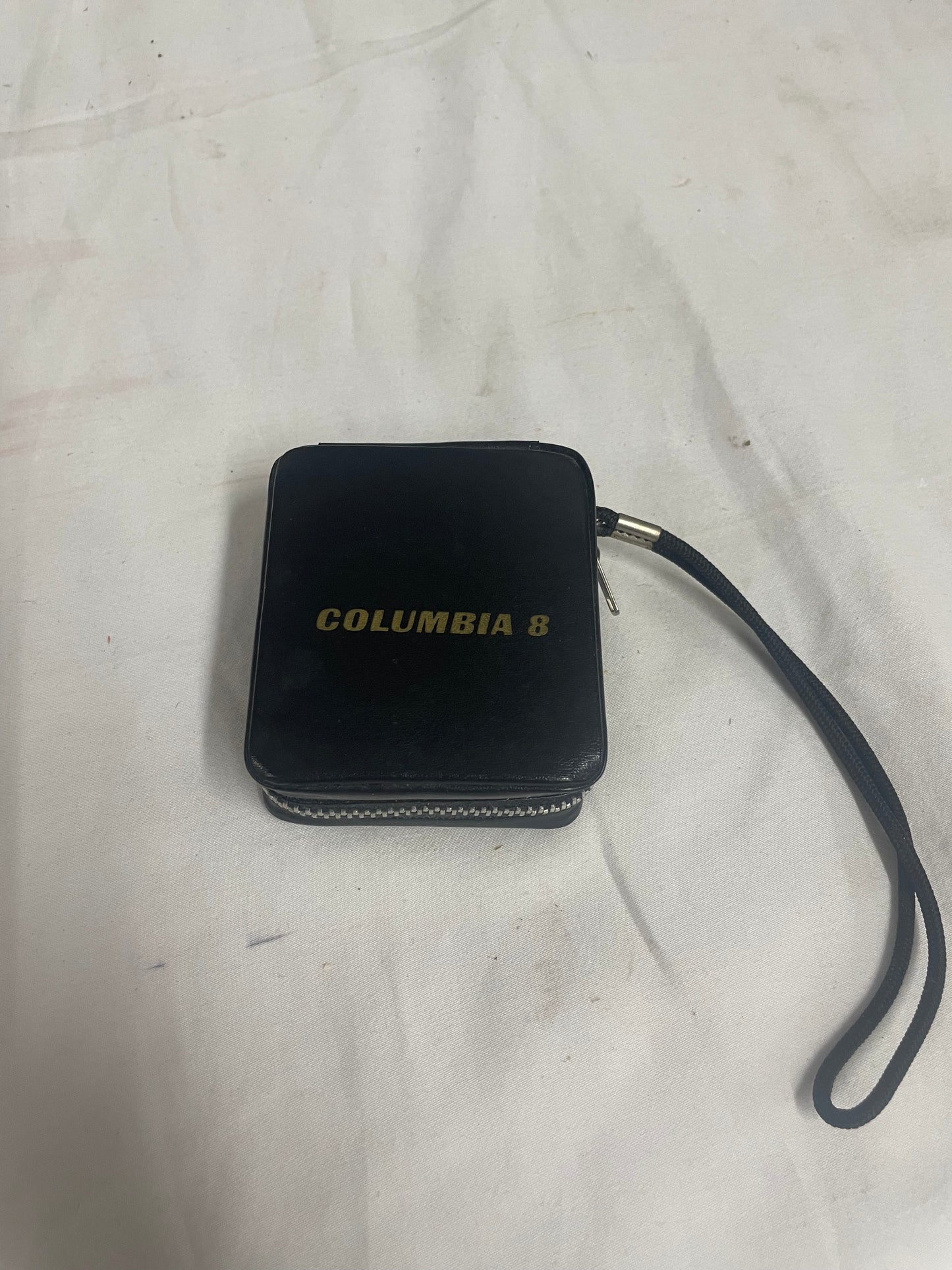 Columbia 8 Pocket transistor radio. JT-602. Black radio. Very small. Comes with leather case.