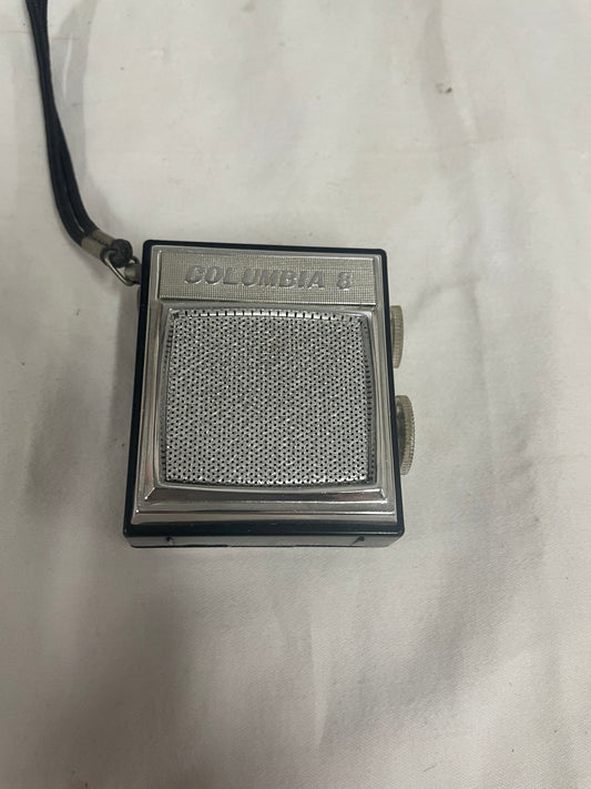 Columbia 8 Pocket transistor radio. JT-602. Black radio. Very small. Comes with leather case.