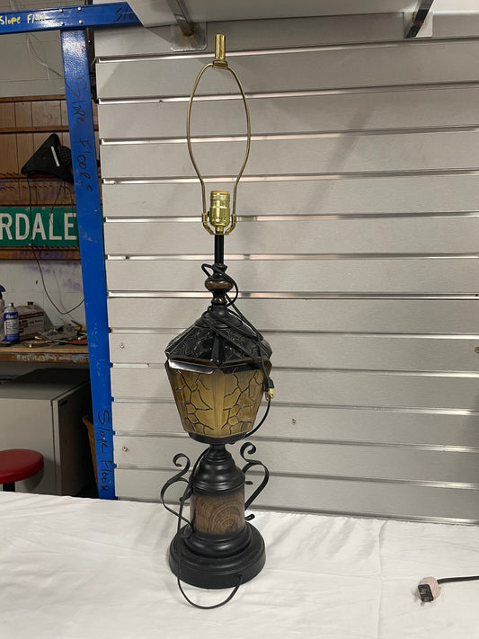 Black Metal Lantern Design Lamp. Glass Lamps is 35” tall and 8” wide.