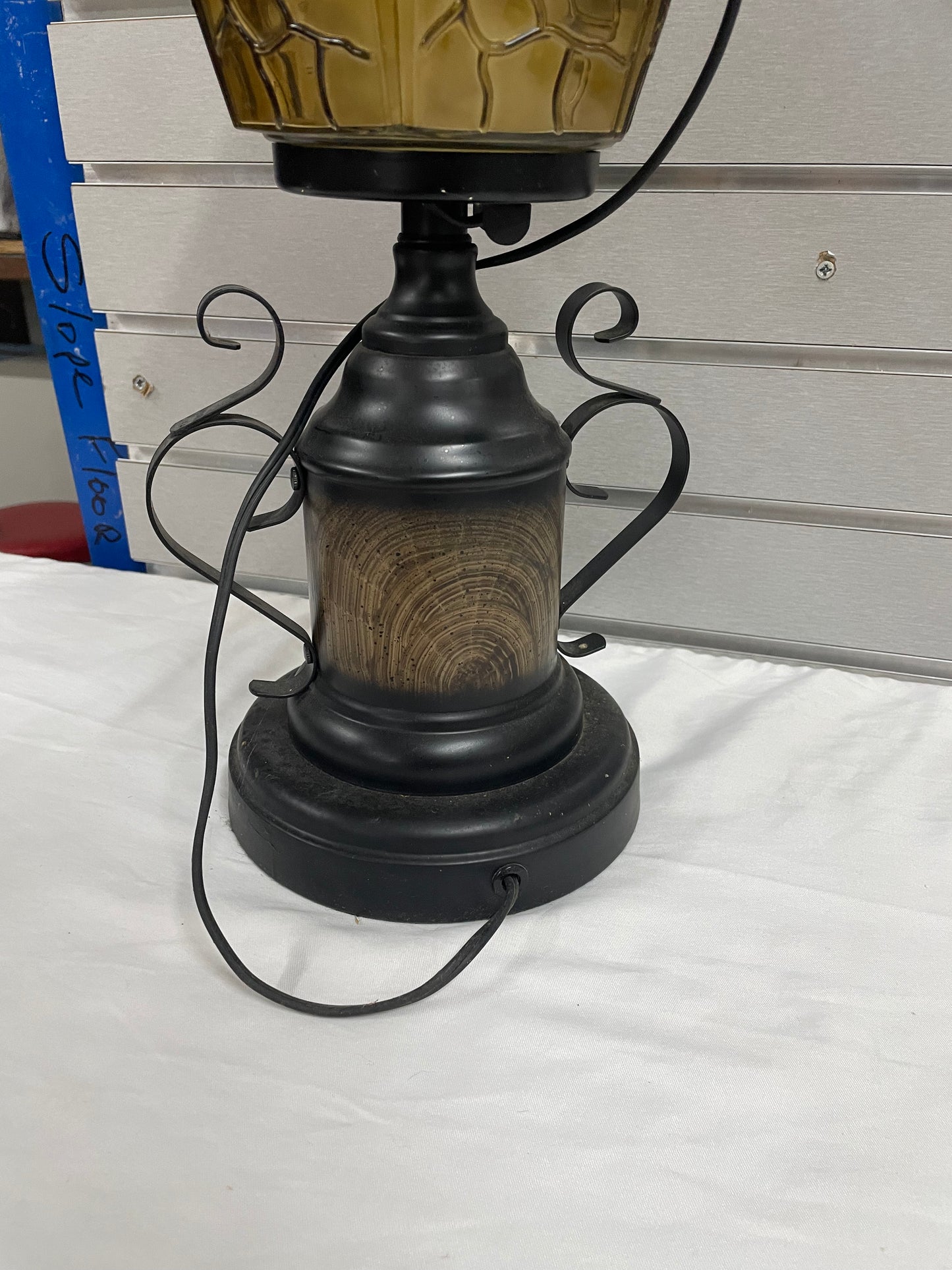 Black Metal Lantern Design Lamp. Glass Lamps is 35” tall and 8” wide.