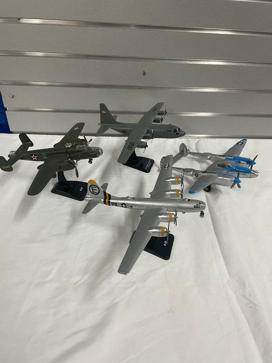 Lot of Bomber planes. Four planes included. B-25 Bomber. B-29 Bomber. Lockheed C-130 Hercules. P-38 Margaret 194. All planes are 1:130 scale. All plastic.