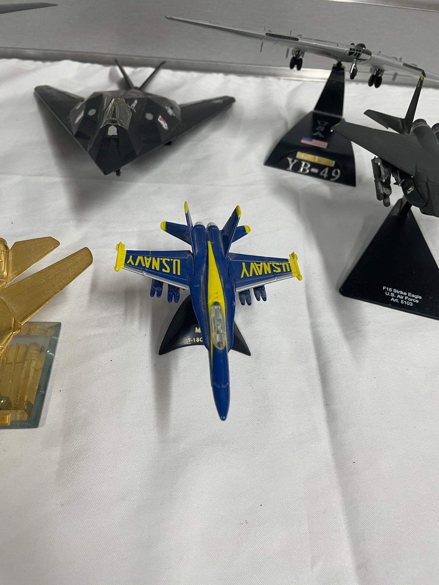 Lot of winged fighter jets / planes. 7 planes in total. All are plastic models. B-2 Spirit. YB-49. YF-23 Black Widow 2. F-14A Tomcat. F-18C Hornet. F15 Strike Eagle. 37 TFW. 4-10” planes.