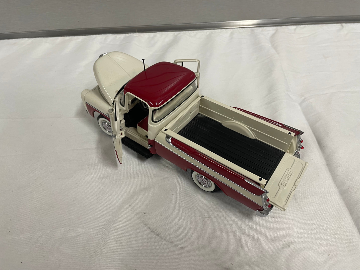 1957 Dodge Sweptside D100 Die cast. The Danbary Mint. 1:24 Scale Metal Truck. Doors/ Hood and trunk open up.