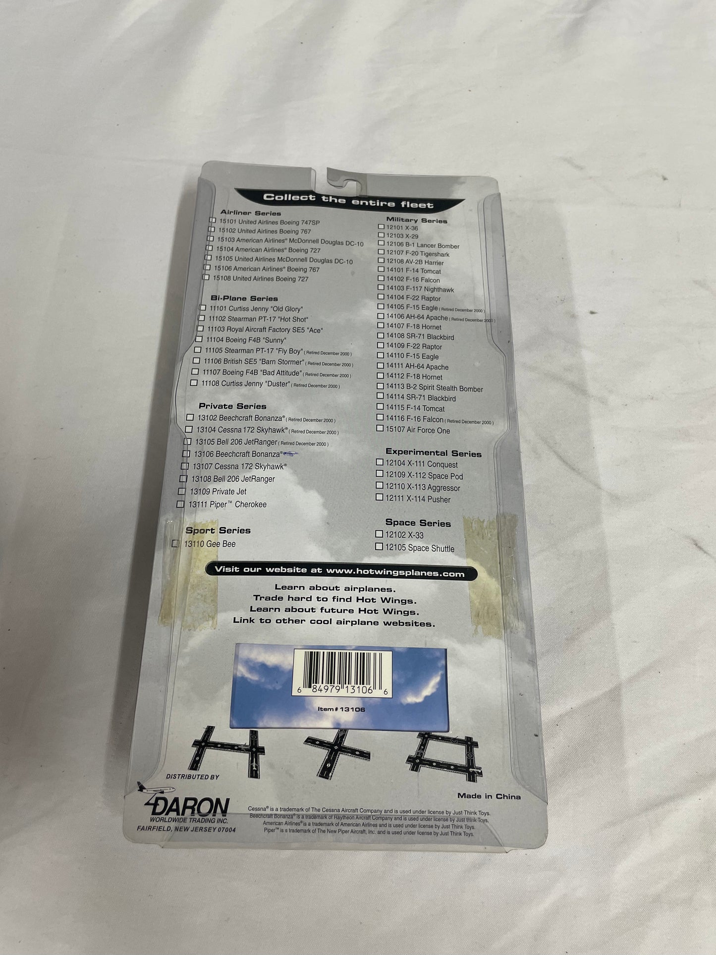 Hot Wings Beechcraft Bonanza Die Cast Collectible Plane. 2001 Collectors edition. 4 inches long. White plane. In original box.