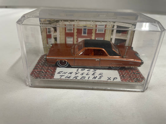 1963 Chrysler Turbine XP Model Car. 1:64 scale. With combustion display case. Orange color.