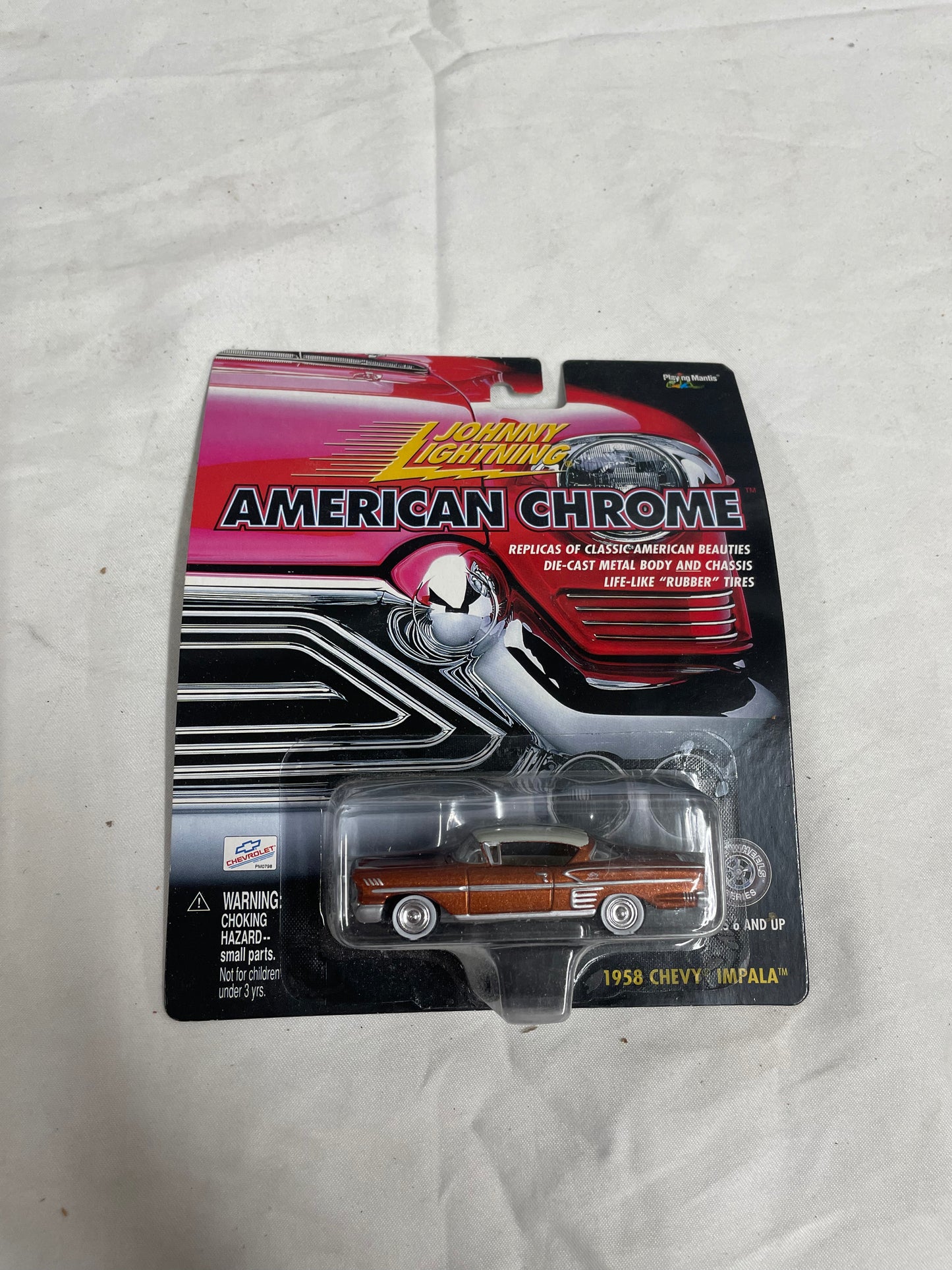 Johnny Lightning American Chrome 1958 Chevy Impala Die Cast Car. 1:64 scale. metal body. Brand new in pavkage