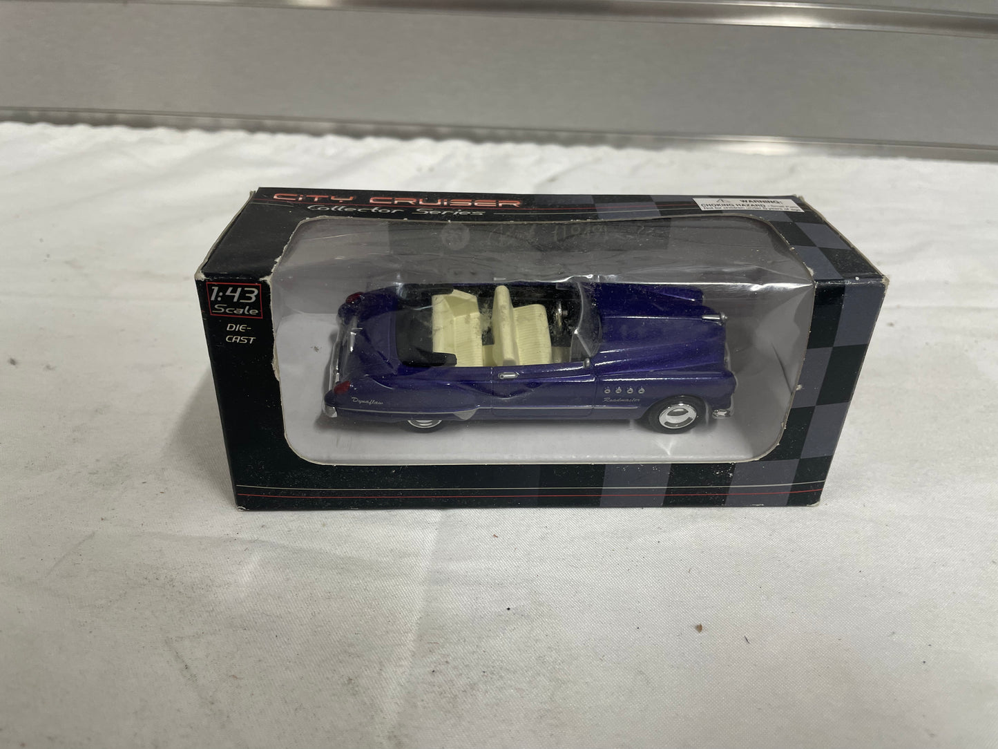 City Cruiser Buick 1949 die cast model car. Purple color. In original box. 1:43 scale car.