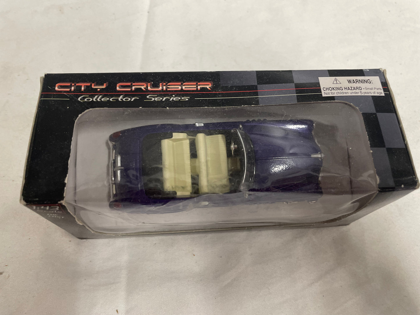 City Cruiser Buick 1949 die cast model car. Purple color. In original box. 1:43 scale car.