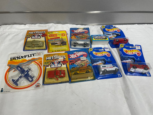 Lot of HotWheels, Matchbox, Hit Shot, DynaFlite Cars. Dyna-Flite 22WR Air Plane. Hot Wheels: ‘40 Woodie, Auburn 852, Ambulance, Fire-Eater, Ferrari Testarossa. Ford Fast Wheel, Matchbox Harley Davidson. 5170058