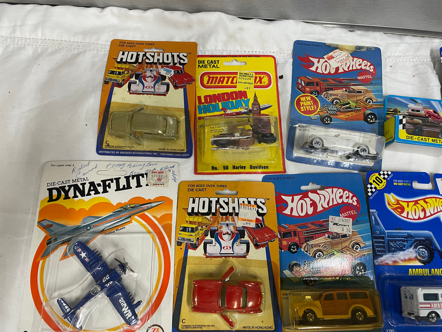 Lot of HotWheels, Matchbox, Hit Shot, DynaFlite Cars. Dyna-Flite 22WR Air Plane. Hot Wheels: ‘40 Woodie, Auburn 852, Ambulance, Fire-Eater, Ferrari Testarossa. Ford Fast Wheel, Matchbox Harley Davidson. 5170058