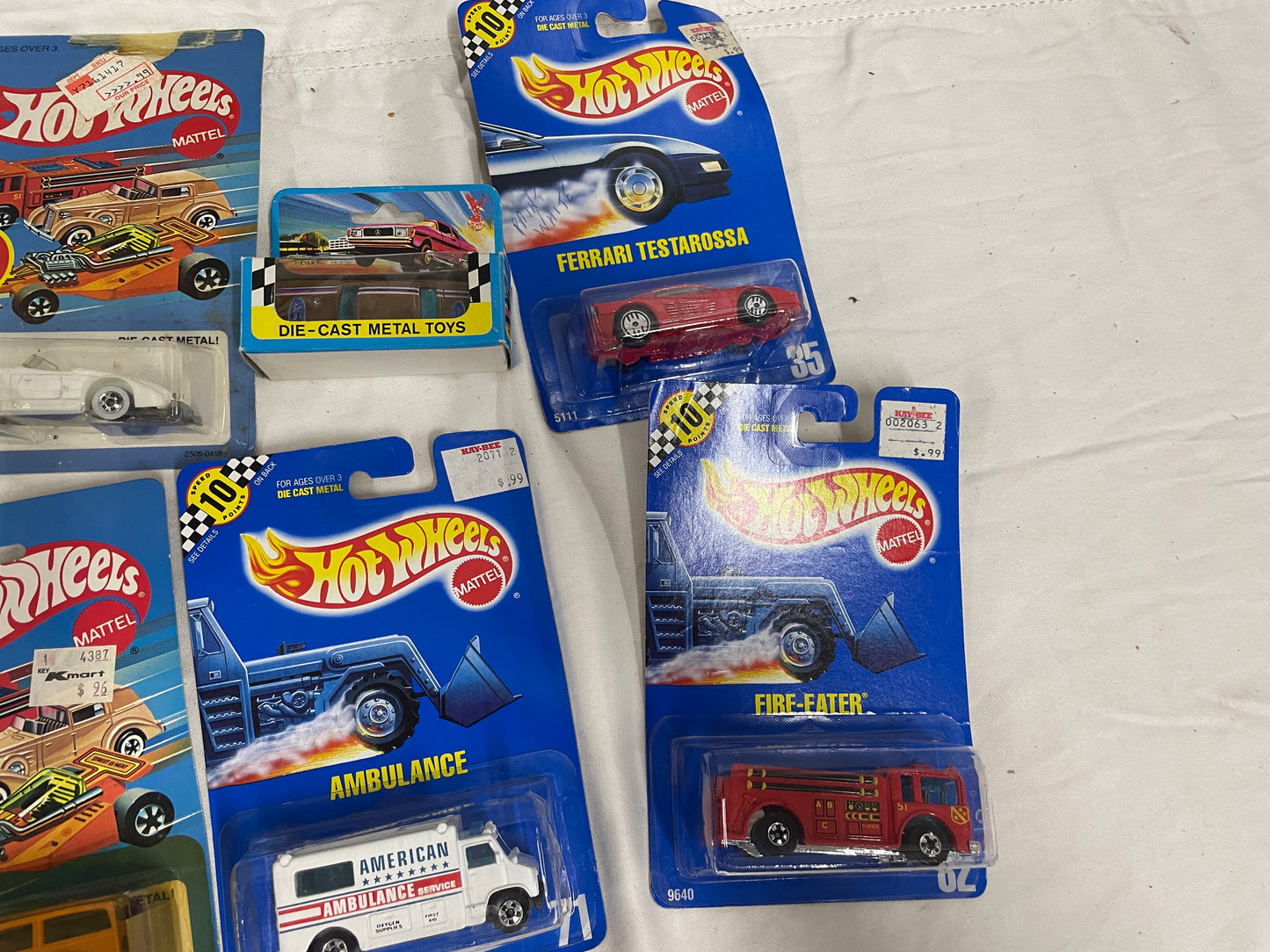 Lot of HotWheels, Matchbox, Hit Shot, DynaFlite Cars. Dyna-Flite 22WR Air Plane. Hot Wheels: ‘40 Woodie, Auburn 852, Ambulance, Fire-Eater, Ferrari Testarossa. Ford Fast Wheel, Matchbox Harley Davidson. 5170058