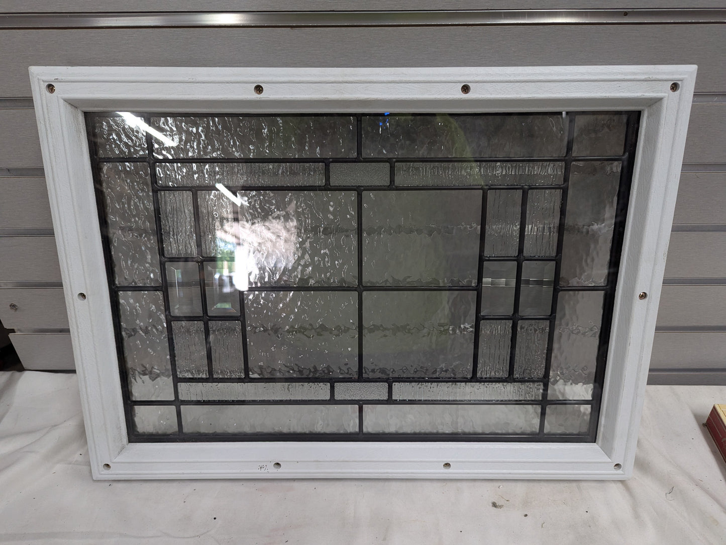 DEMO Door Lite Sidelight Window wrought iron textured glass. White trim 24" x 17"