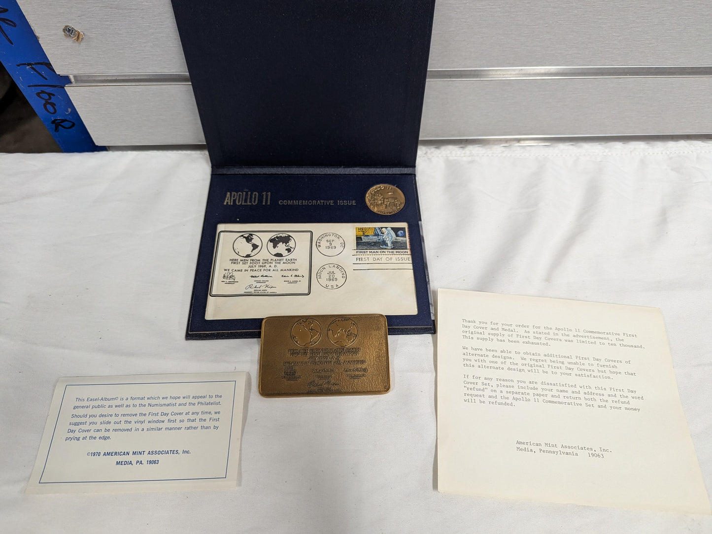 1969 Apollo 11 commemorative plaque and coin collection first day cover and metal